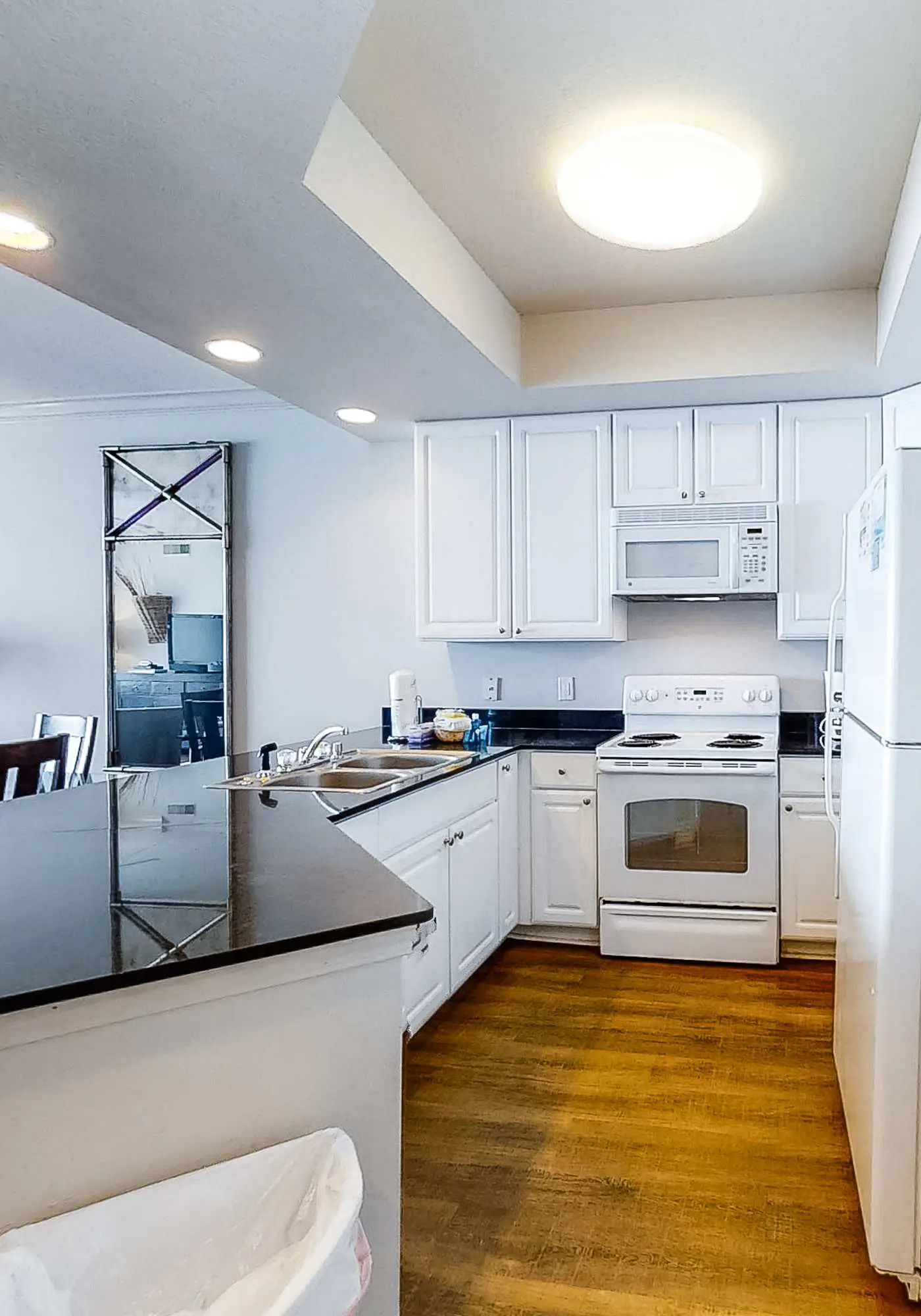 Gulf-front condo with pool, sauna, washer dryer, central AC, & gym