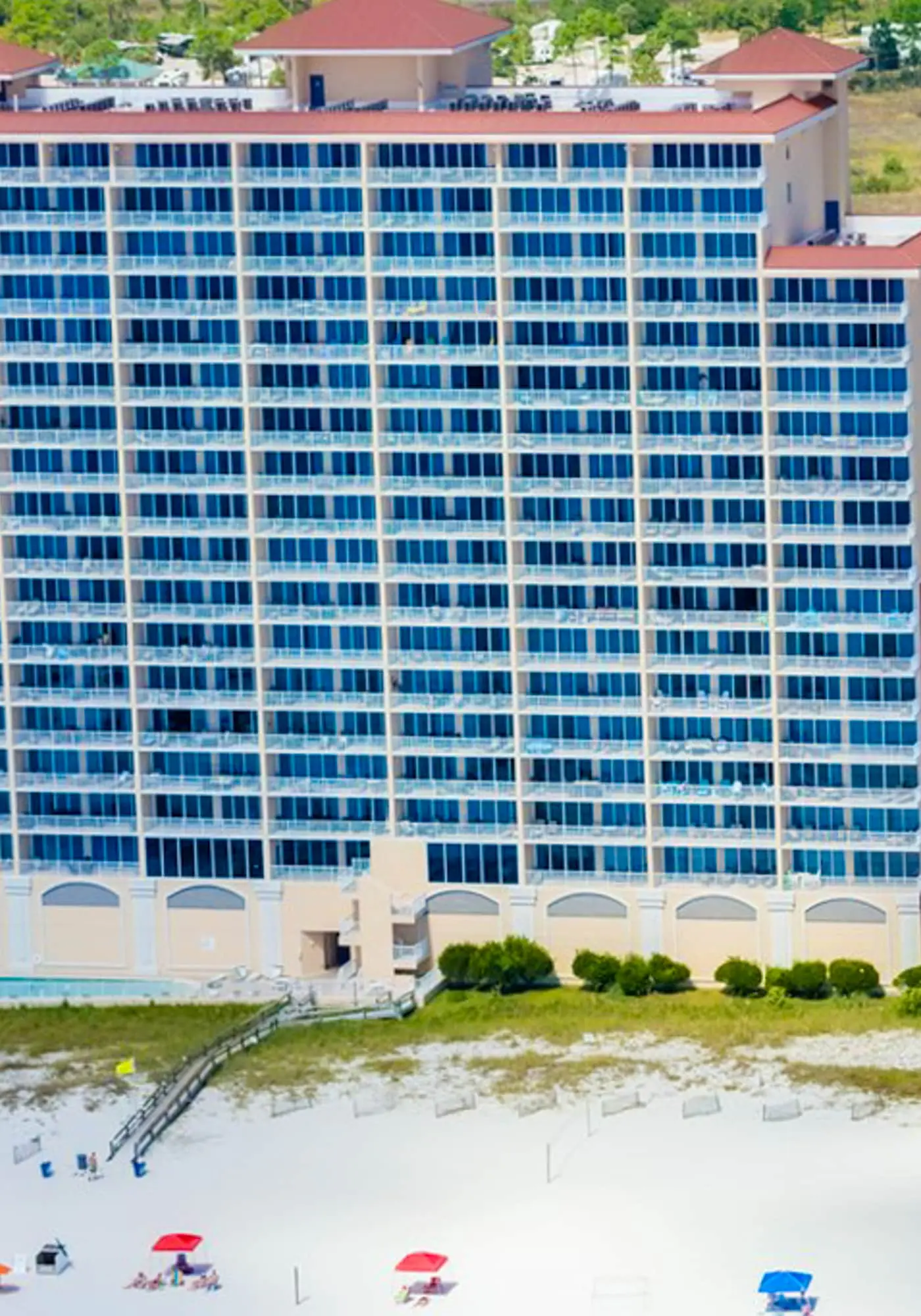 Gulf-front condo with pool, sauna, washer dryer, central AC, & gym