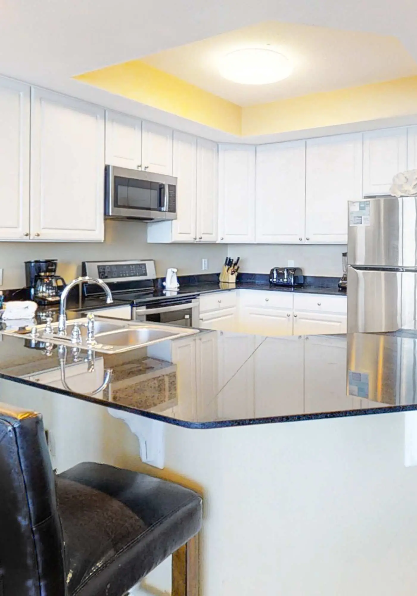 Gulf-front penthouse with pool, sauna, washer,dryer, & central AC
