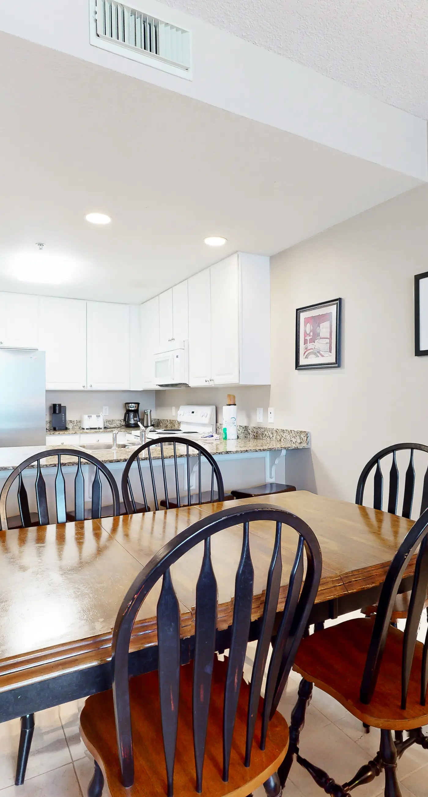 Waterfront condo with pool, hot tub, sauna, central AC, washer/dryer, & balcony