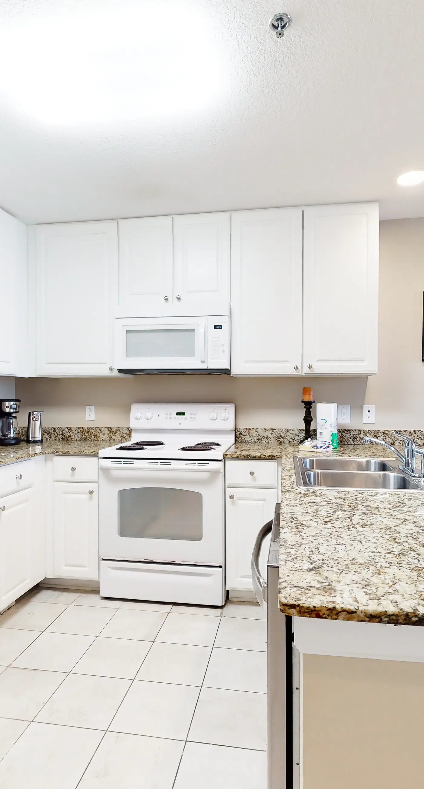 Waterfront condo with pool, hot tub, sauna, central AC, washer/dryer, & balcony