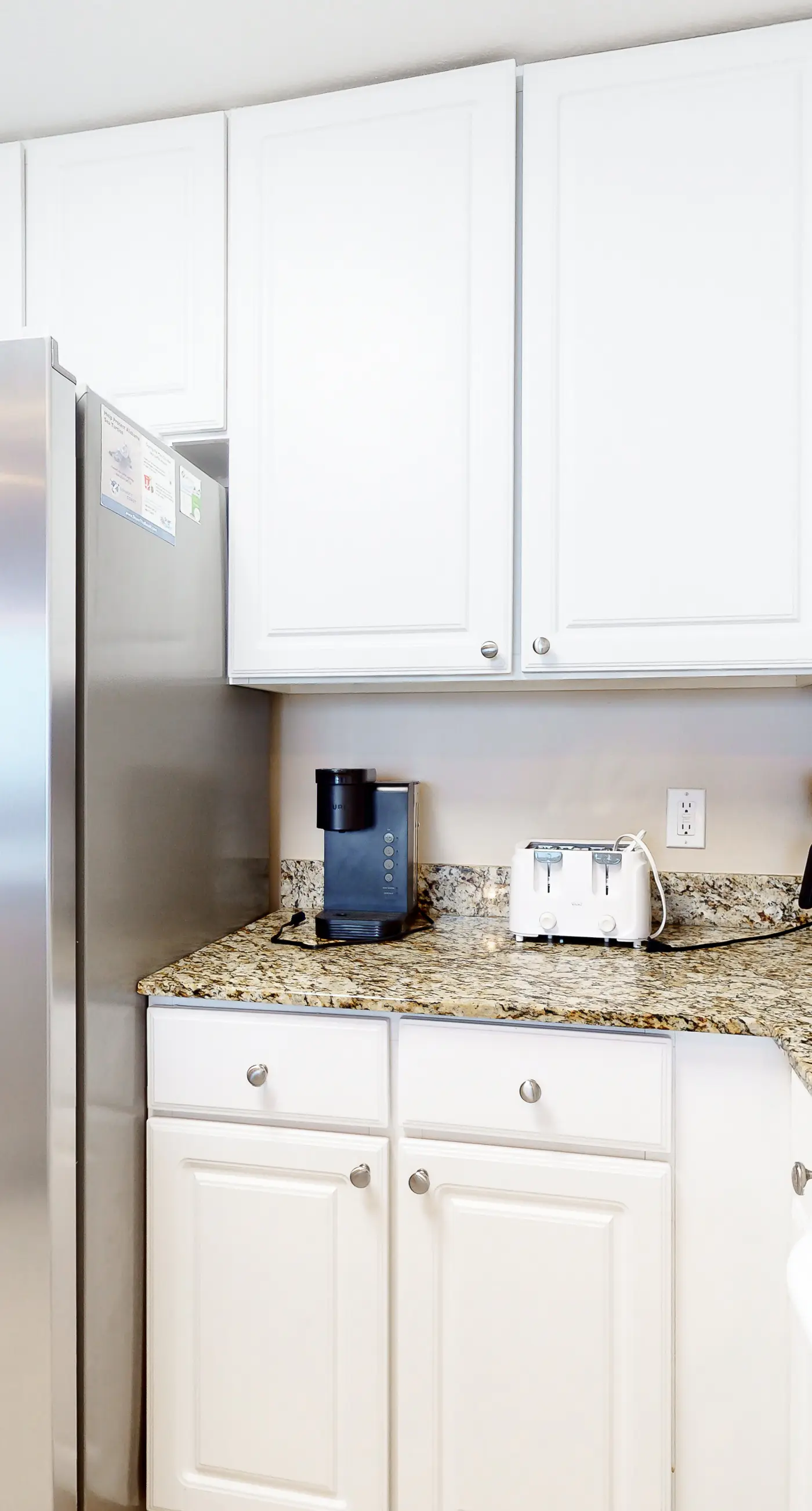 Waterfront condo with pool, hot tub, sauna, central AC, washer/dryer, & balcony