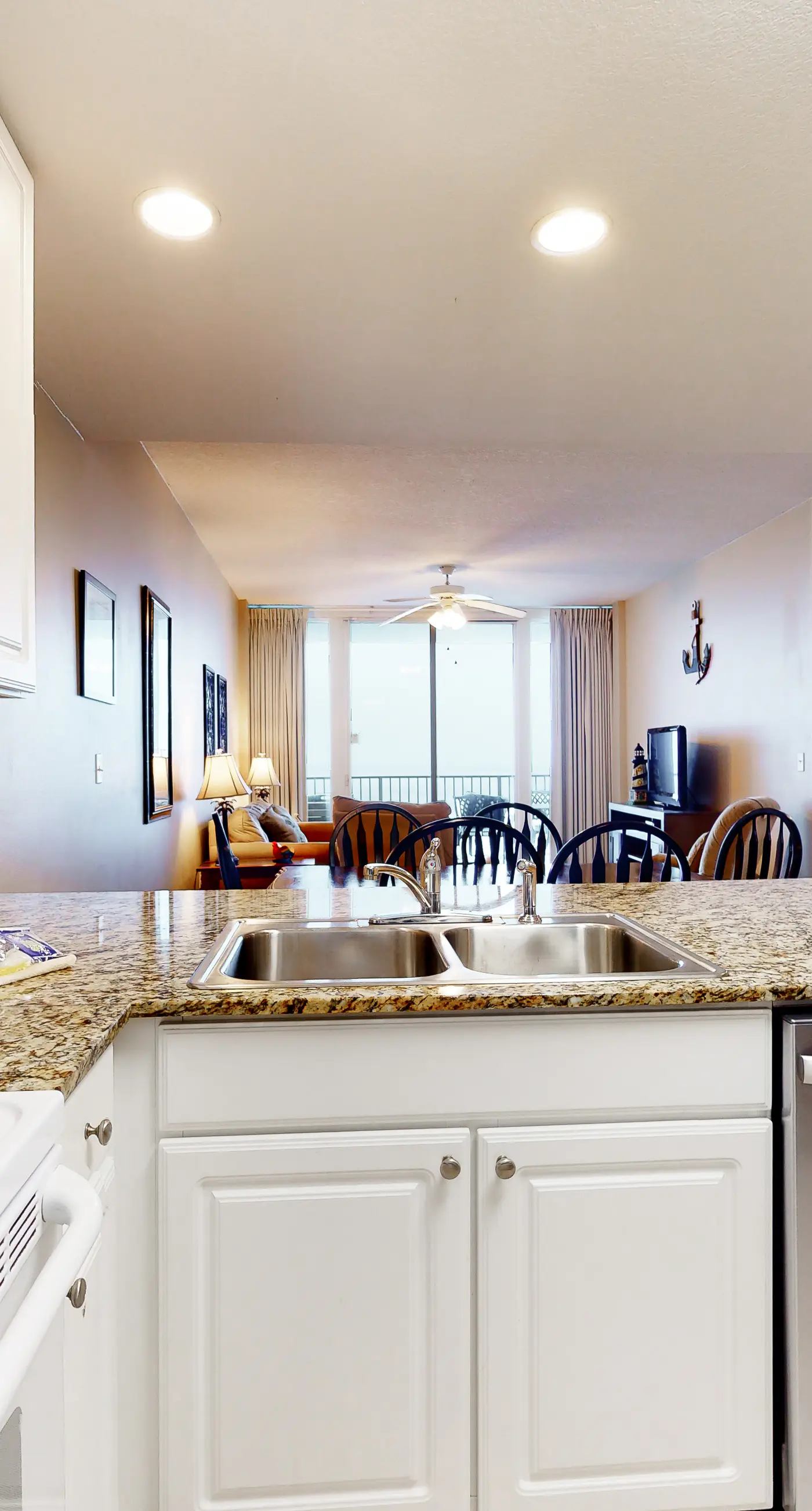 Waterfront condo with pool, hot tub, sauna, central AC, washer/dryer, & balcony