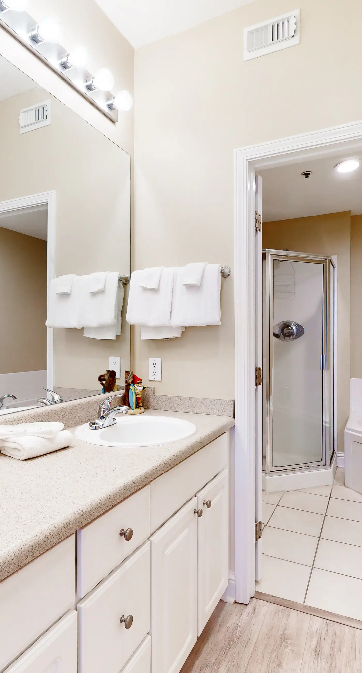 Waterfront condo with pool, hot tub, sauna, central AC, washer/dryer, & balcony