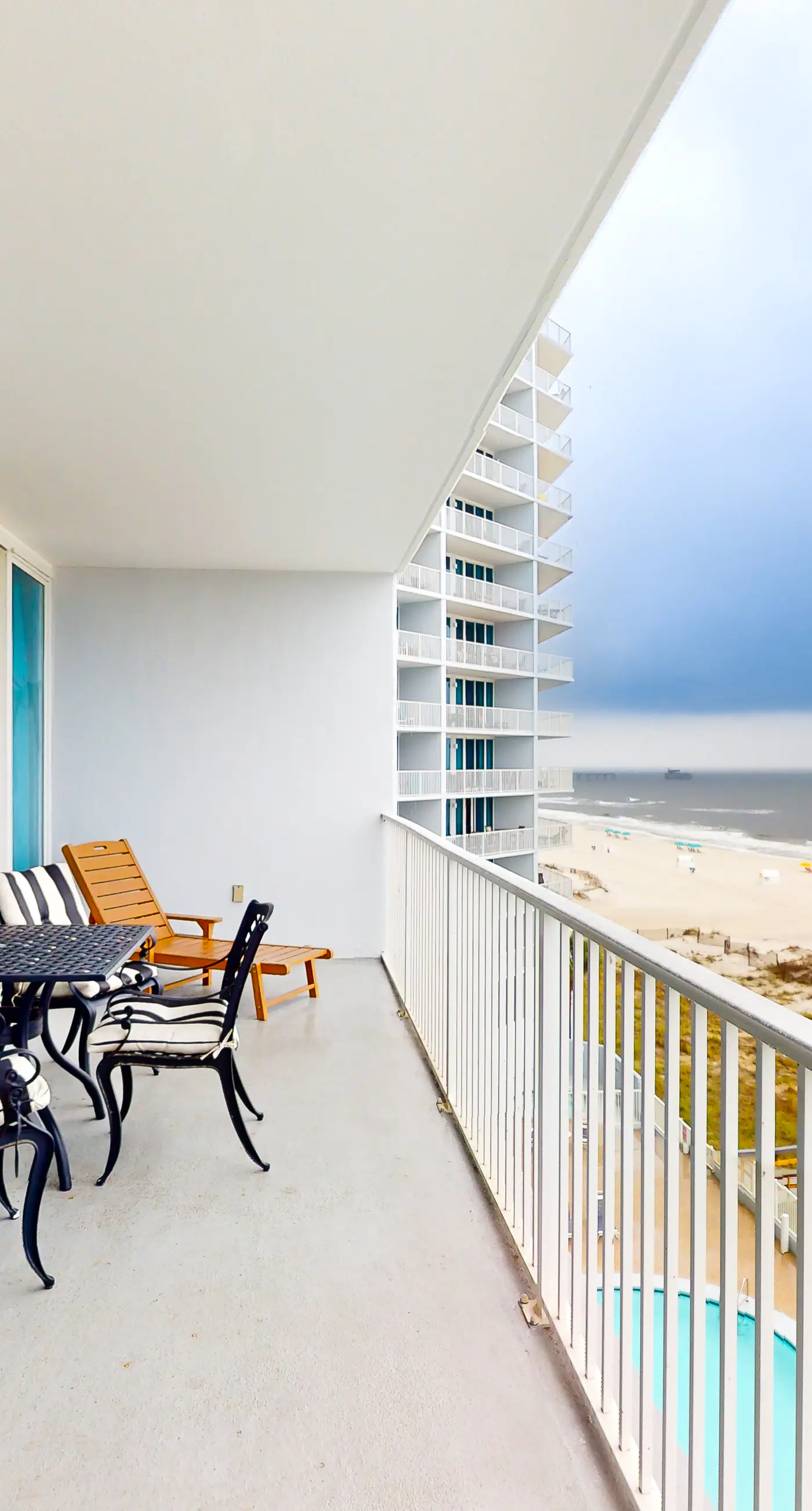 Waterfront condo with pool, hot tub, sauna, central AC, washer/dryer, & balcony