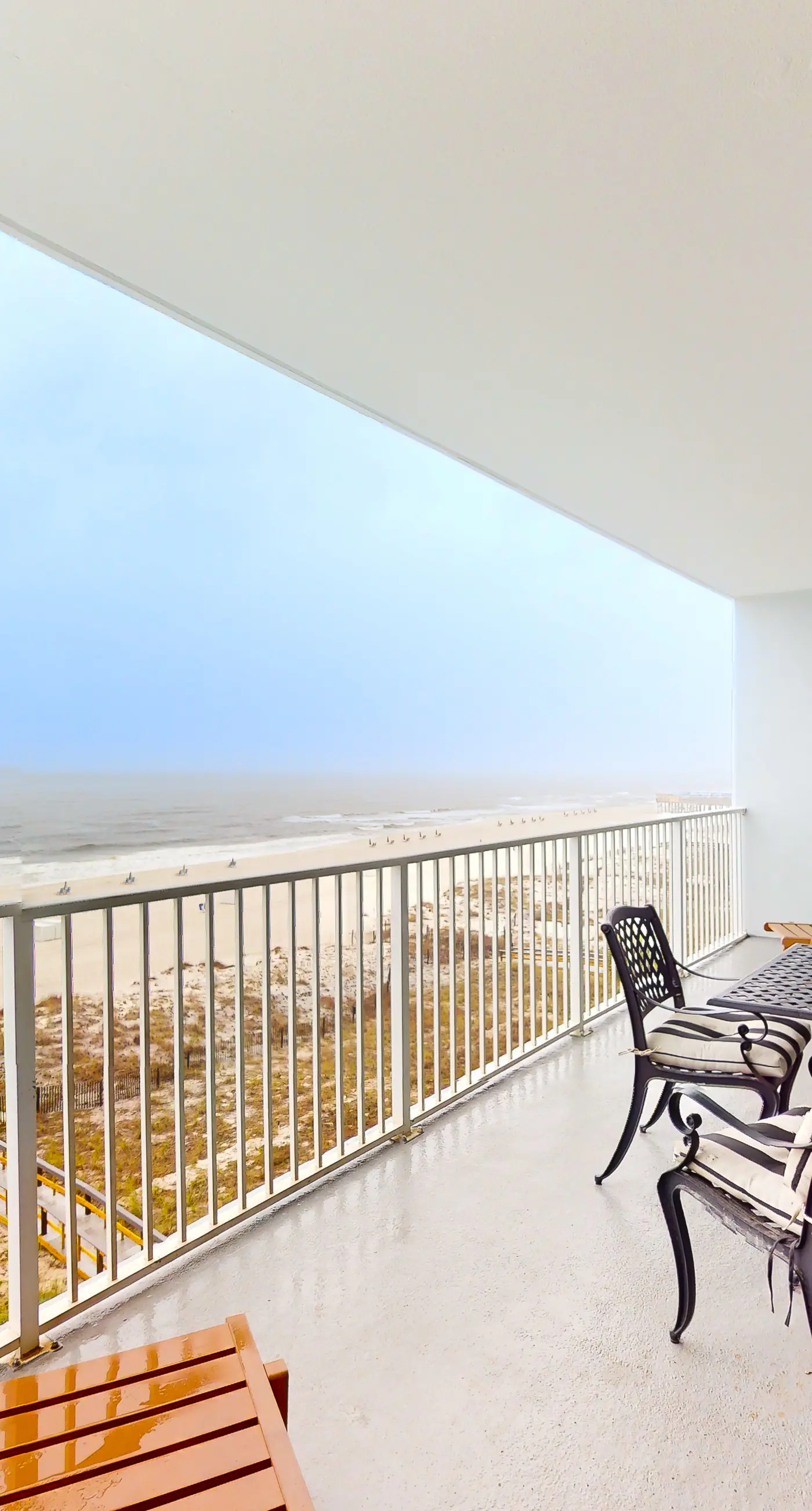 Waterfront condo with pool, hot tub, sauna, central AC, washer/dryer, & balcony