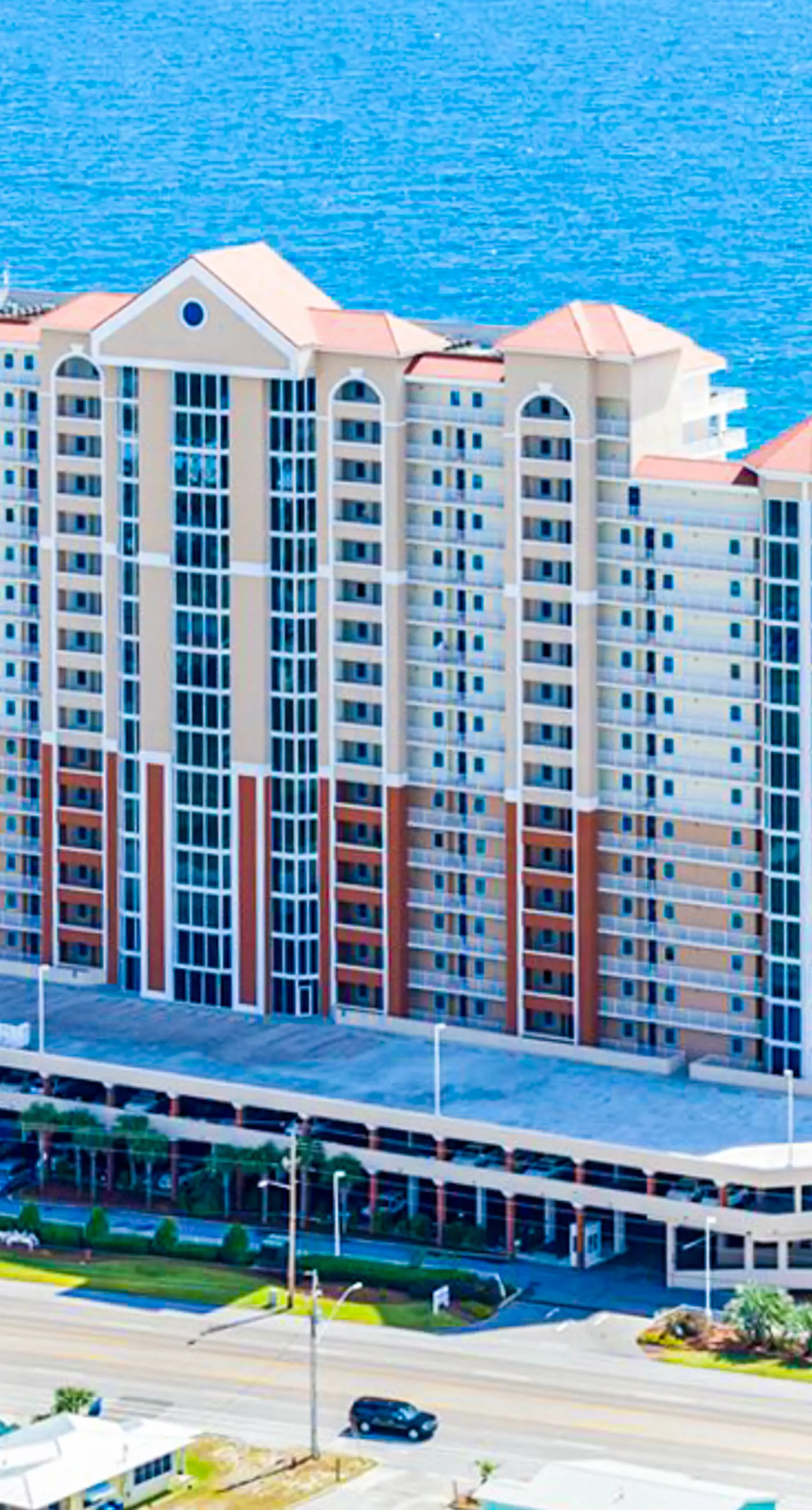 Waterfront condo with pool, hot tub, sauna, central AC, washer/dryer, & balcony