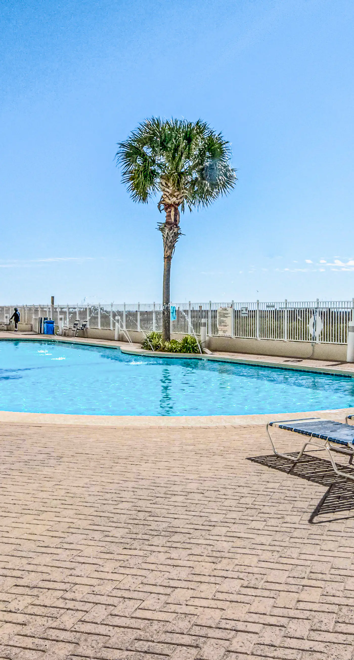 Waterfront condo with pool, hot tub, sauna, central AC, washer/dryer, & balcony