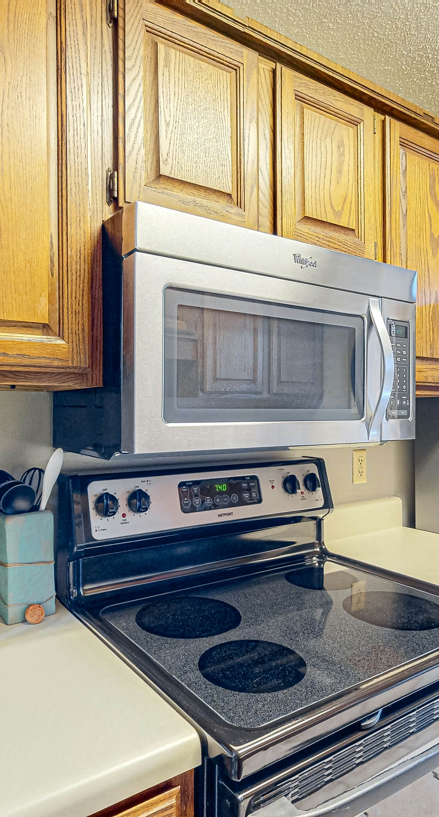 First-floor dog-friendly condo with on-site pool, beach access, & balcony