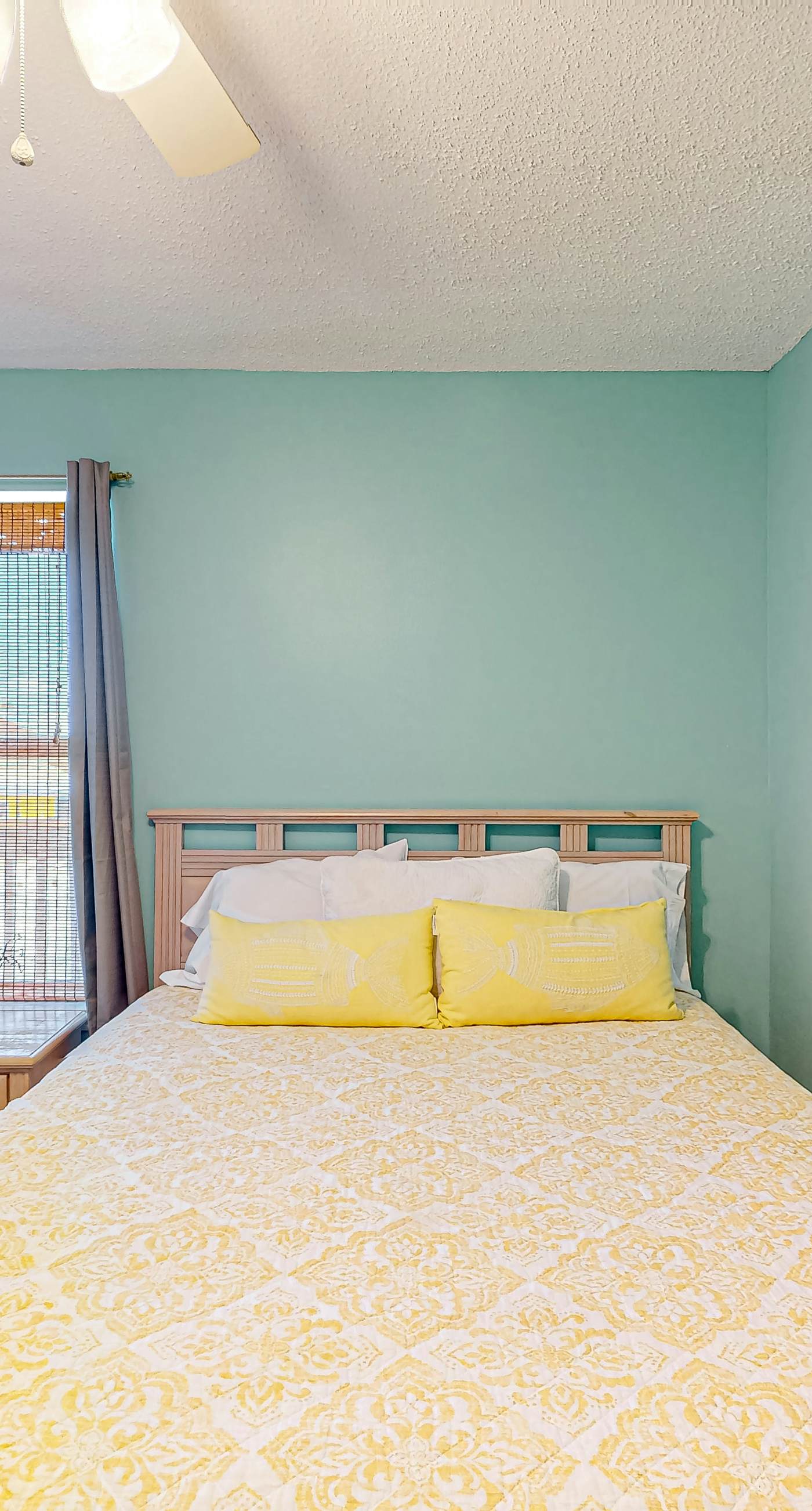 First-floor dog-friendly condo with on-site pool, beach access, & balcony