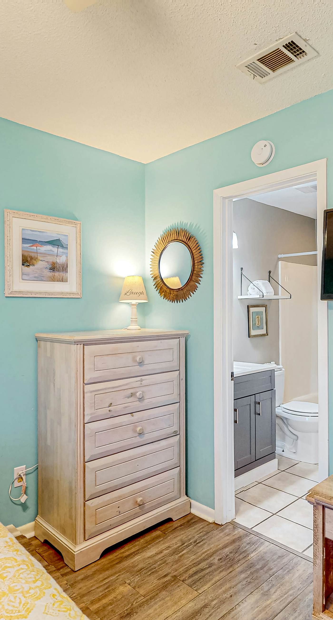 First-floor dog-friendly condo with on-site pool, beach access, & balcony