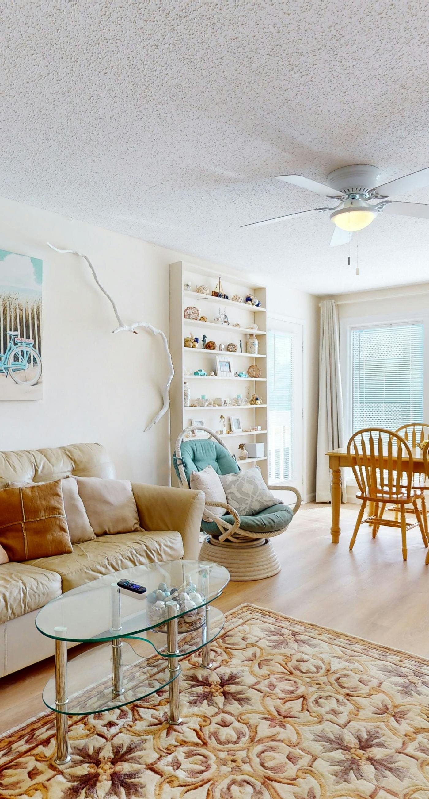 Beach-themed condo with shared pool, pier, and beach access