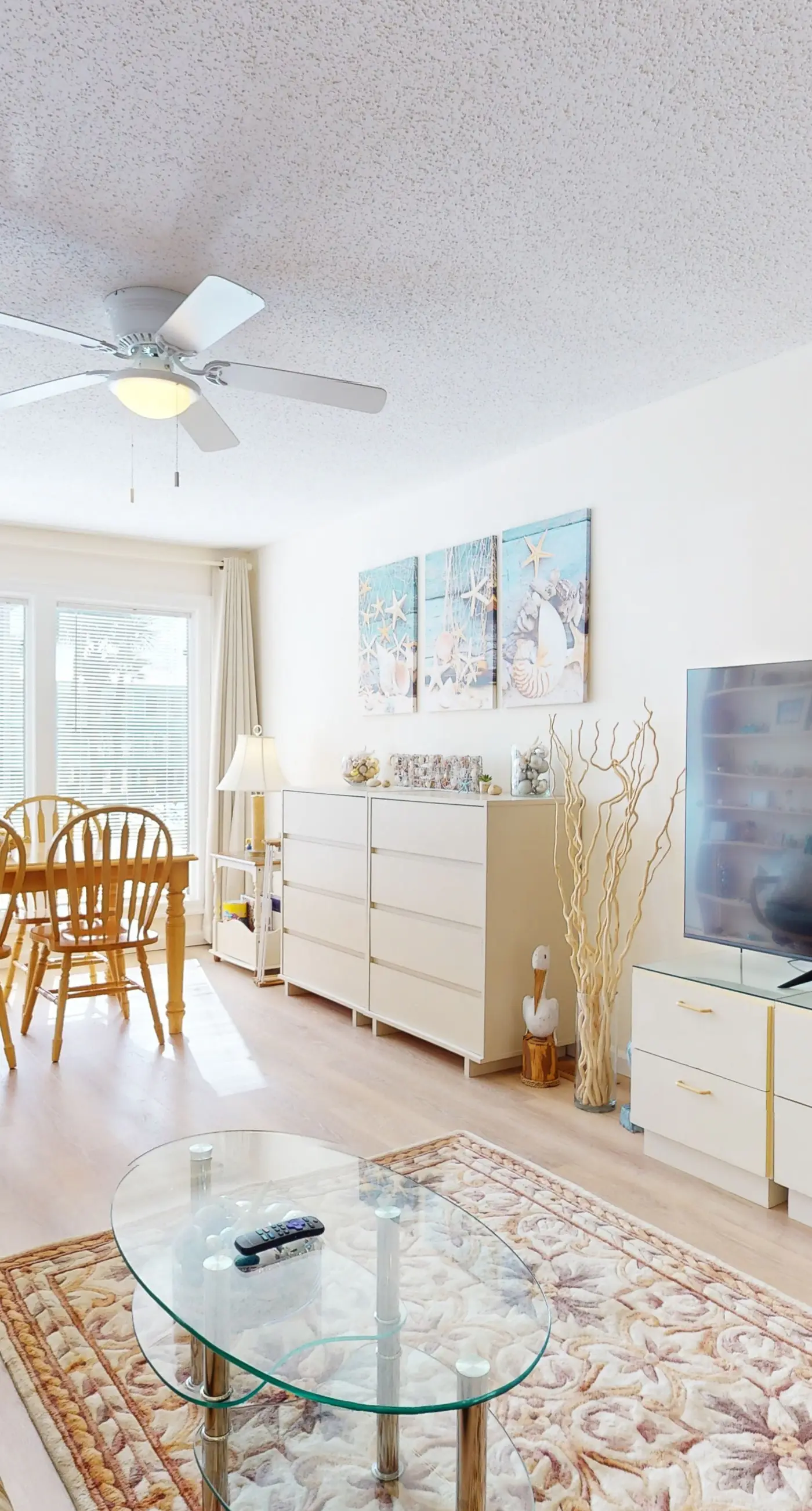 Beach-themed condo with shared pool, pier, and beach access
