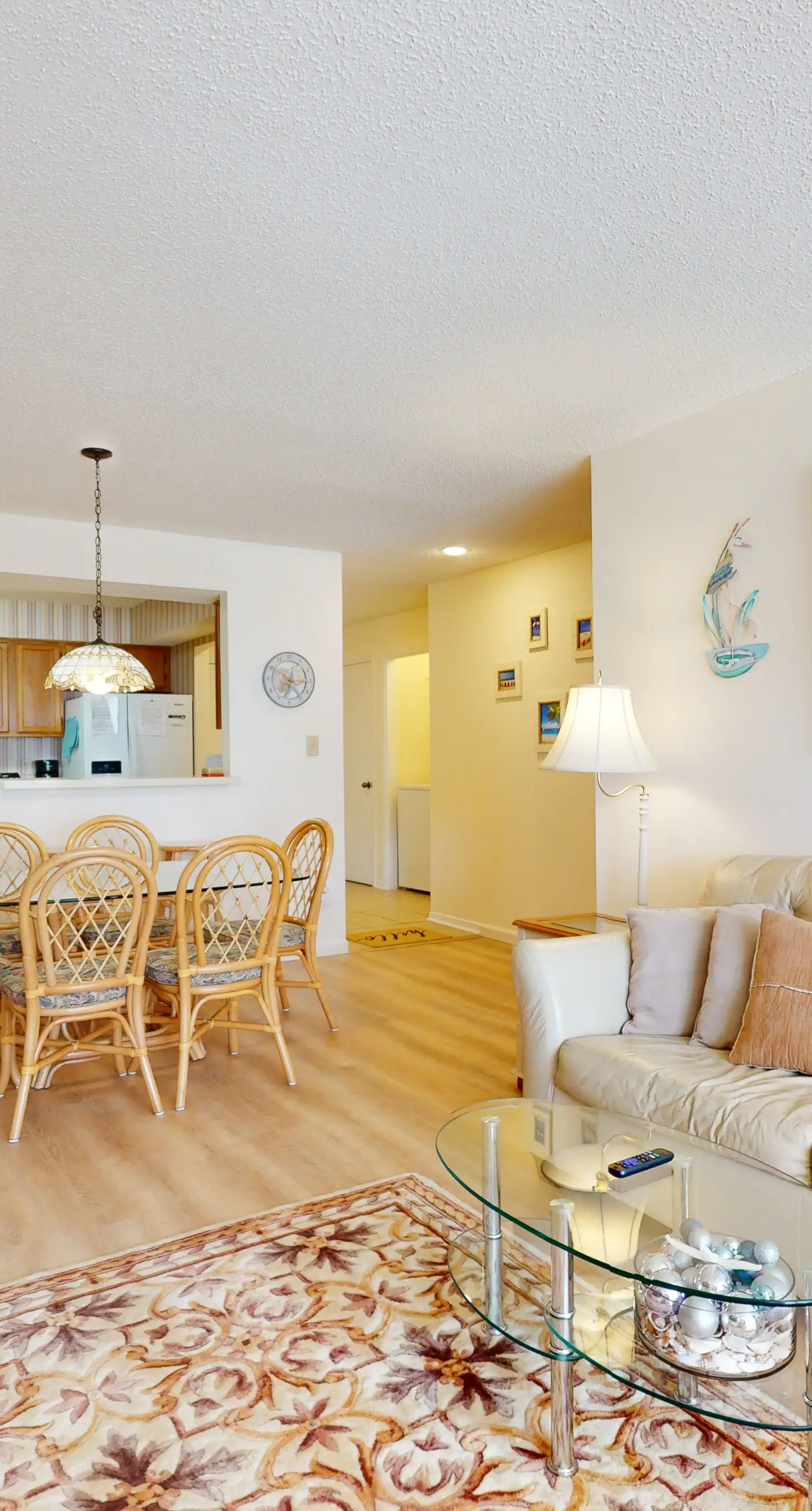 Beach-themed condo with shared pool, pier, and beach access