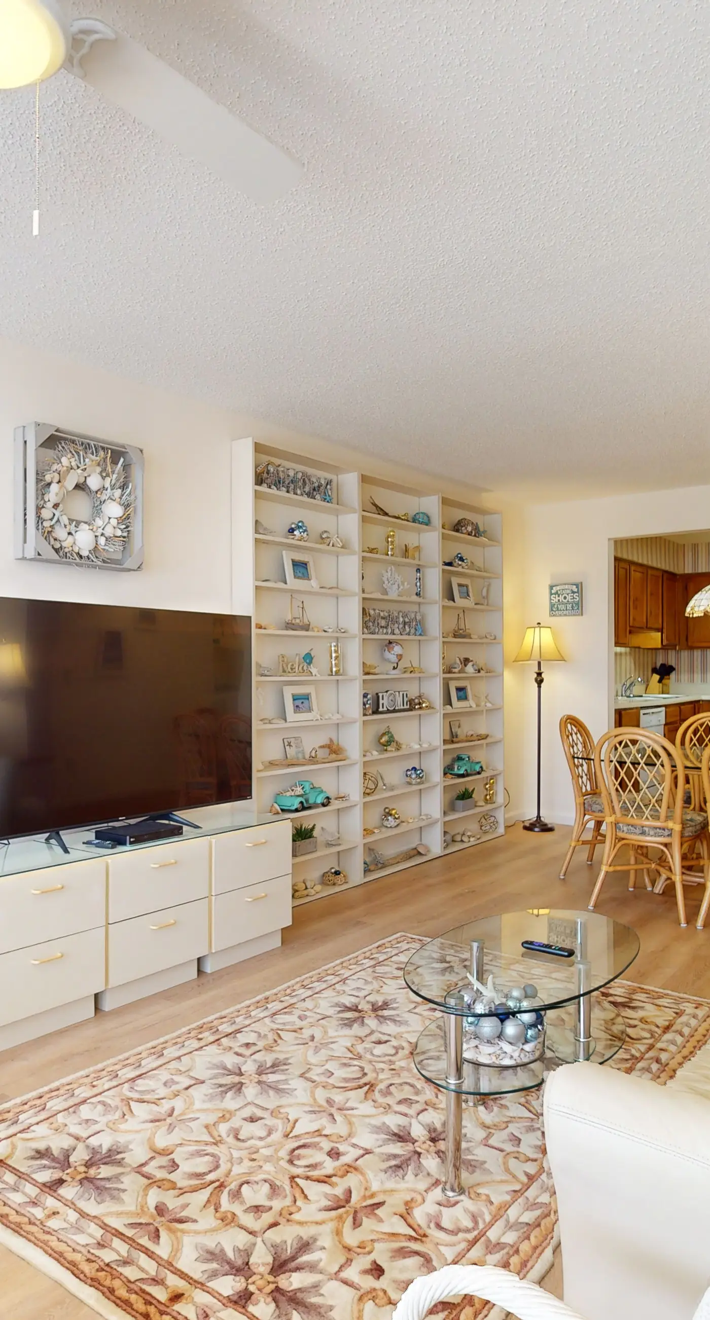 Beach-themed condo with shared pool, pier, and beach access