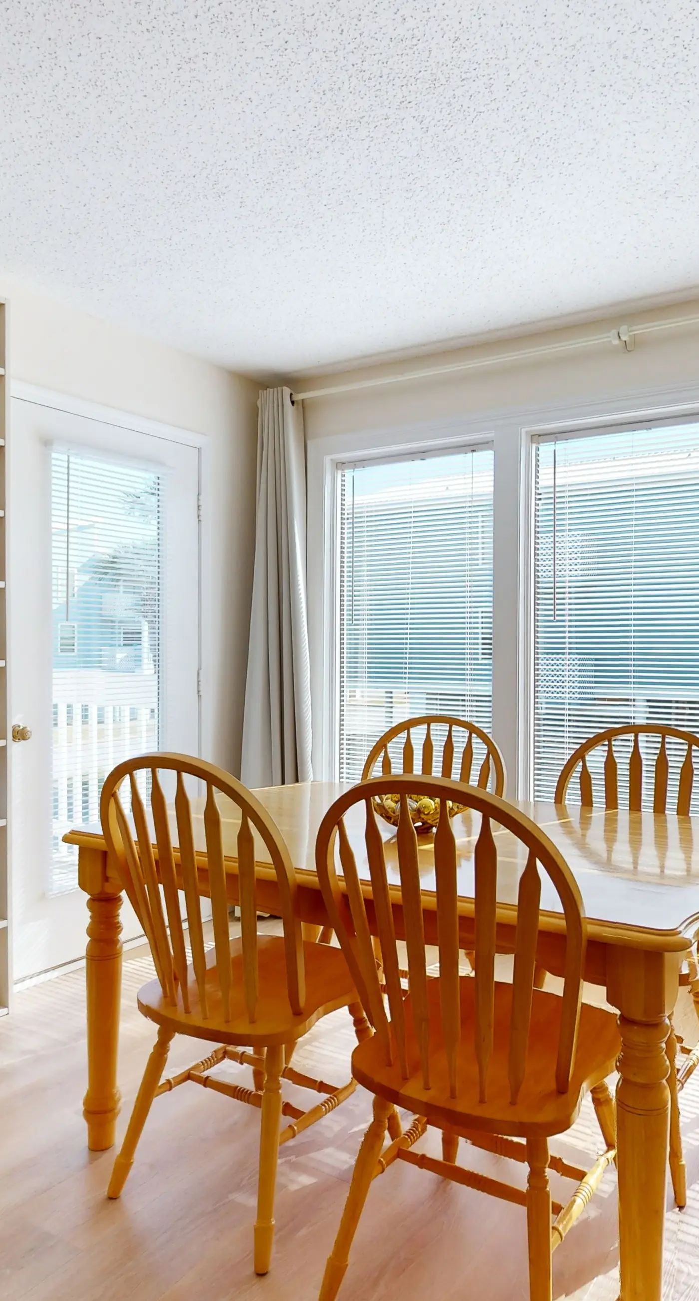 Beach-themed condo with shared pool, pier, and beach access