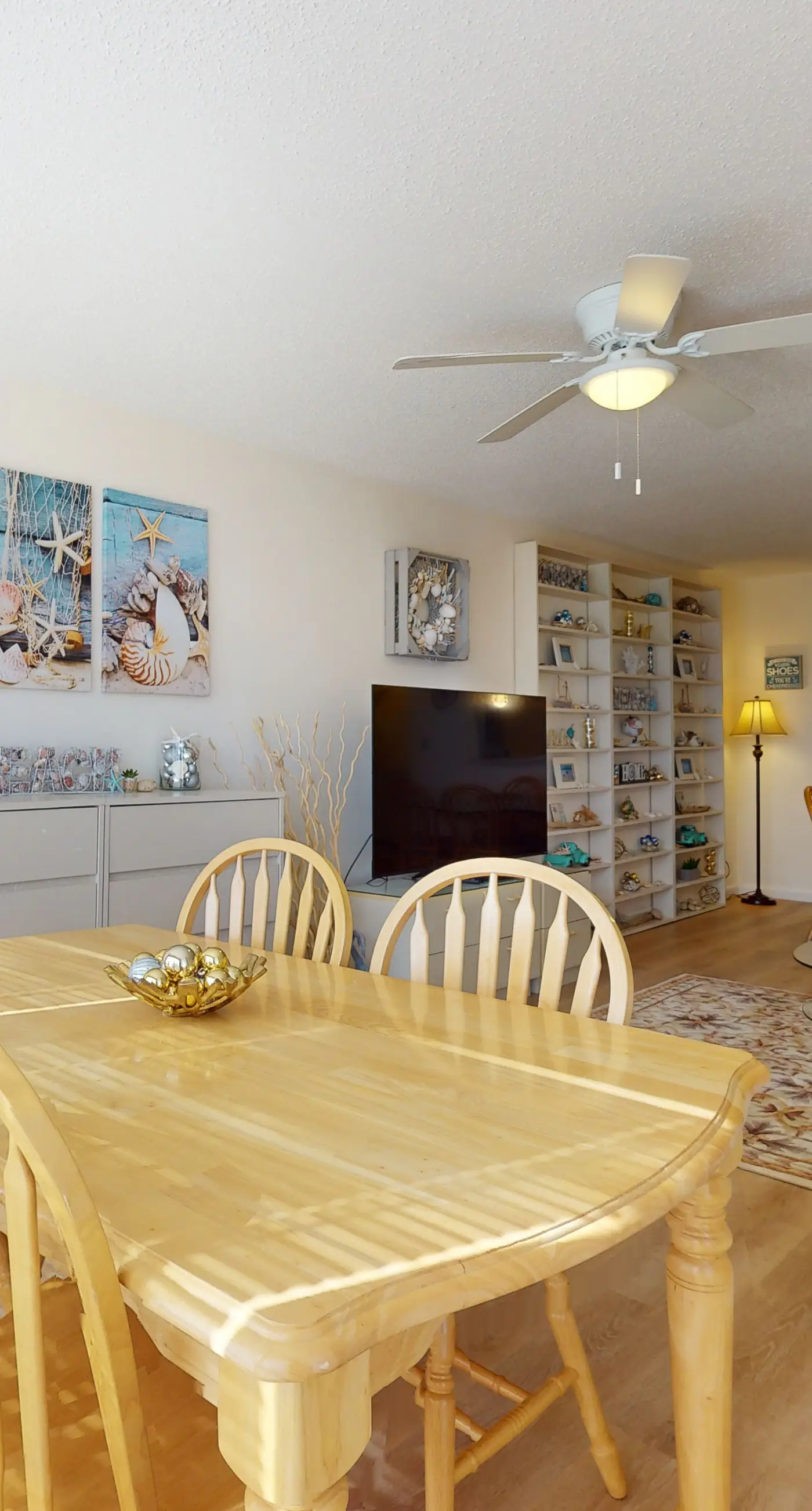 Beach-themed condo with shared pool, pier, and beach access