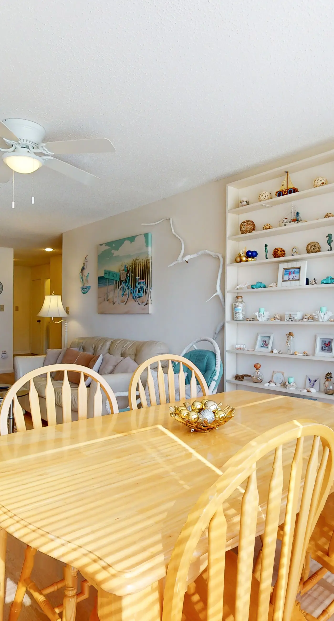 Beach-themed condo with shared pool, pier, and beach access