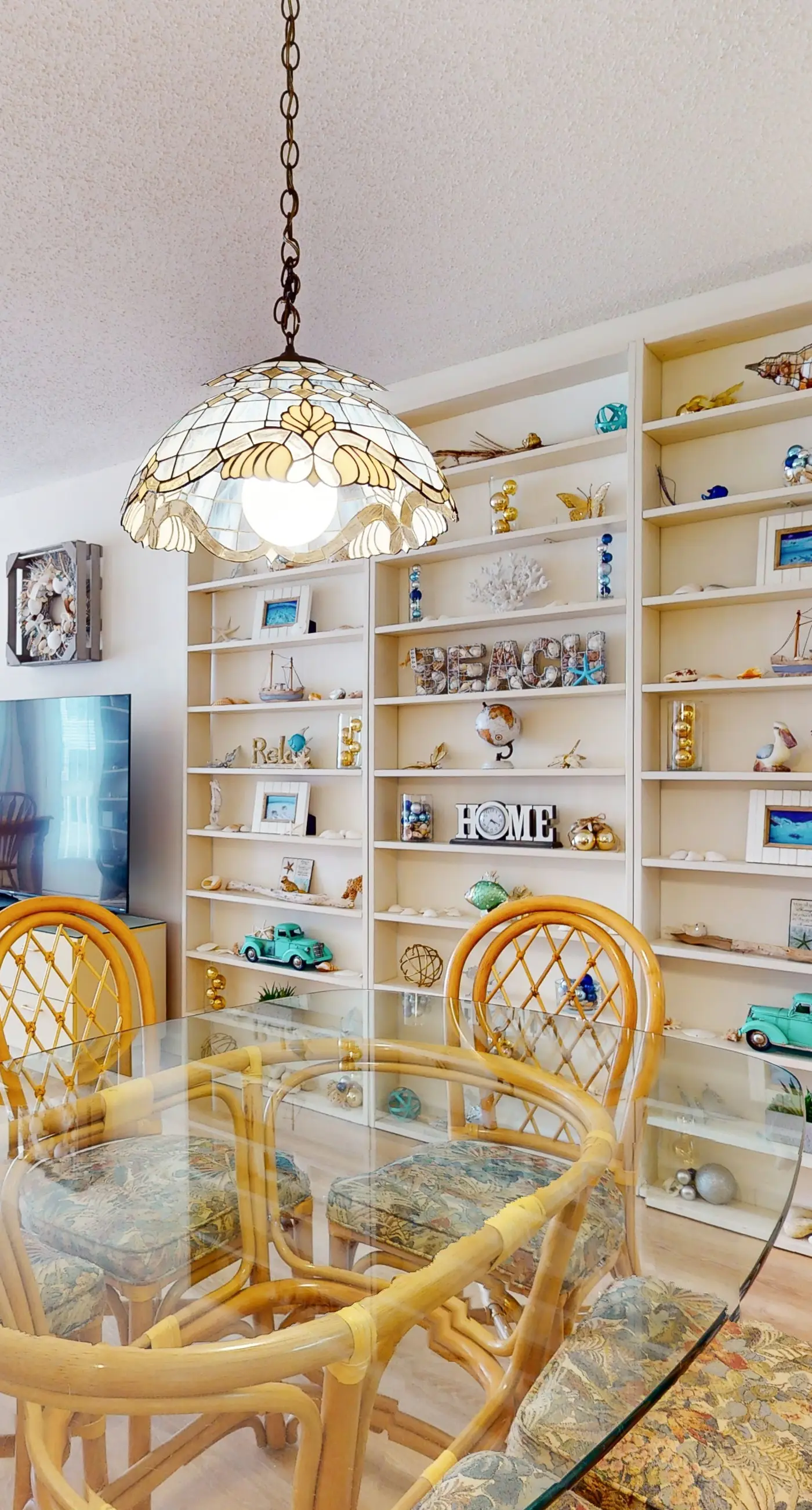 Beach-themed condo with shared pool, pier, and beach access