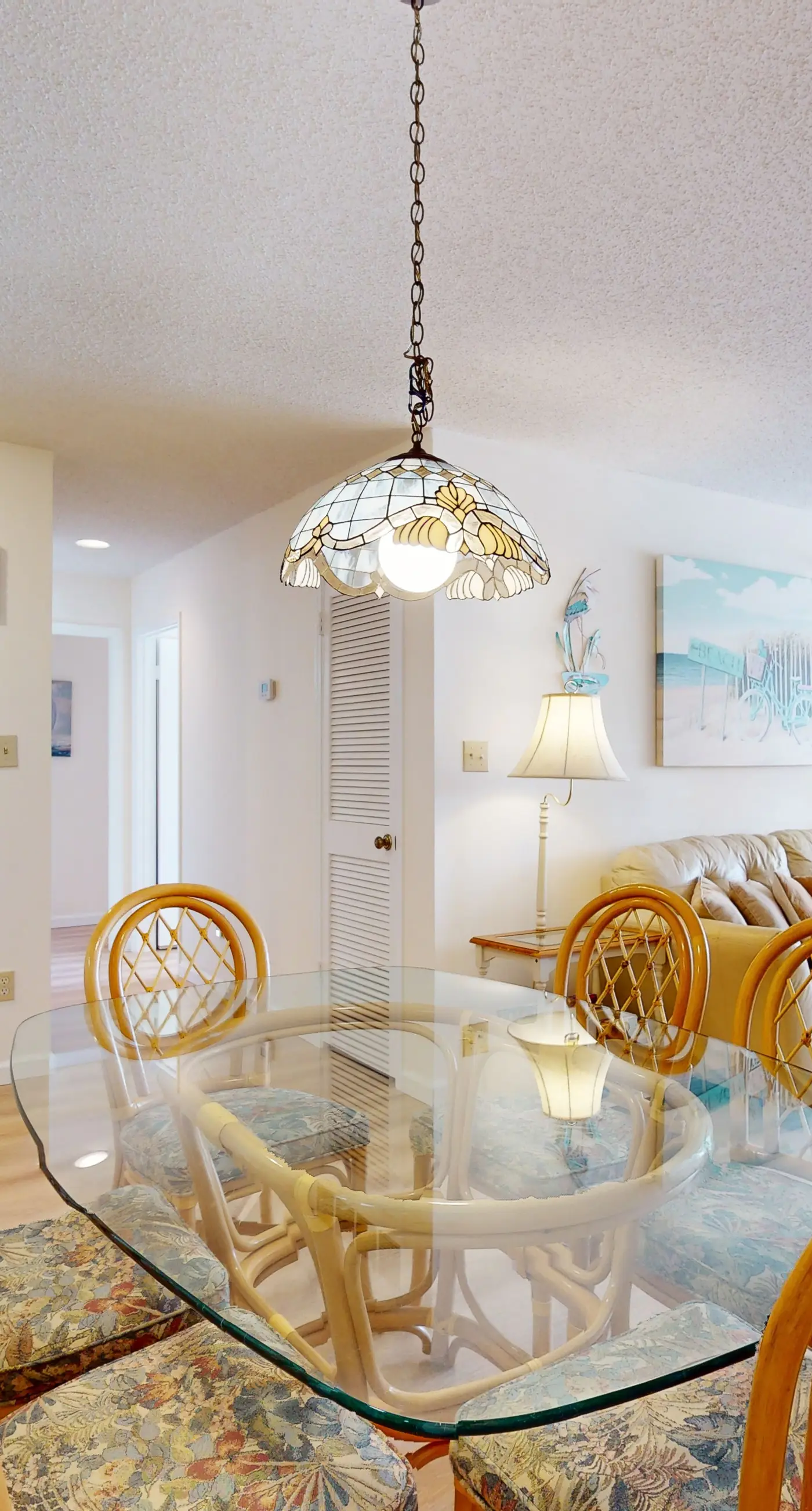 Beach-themed condo with shared pool, pier, and beach access