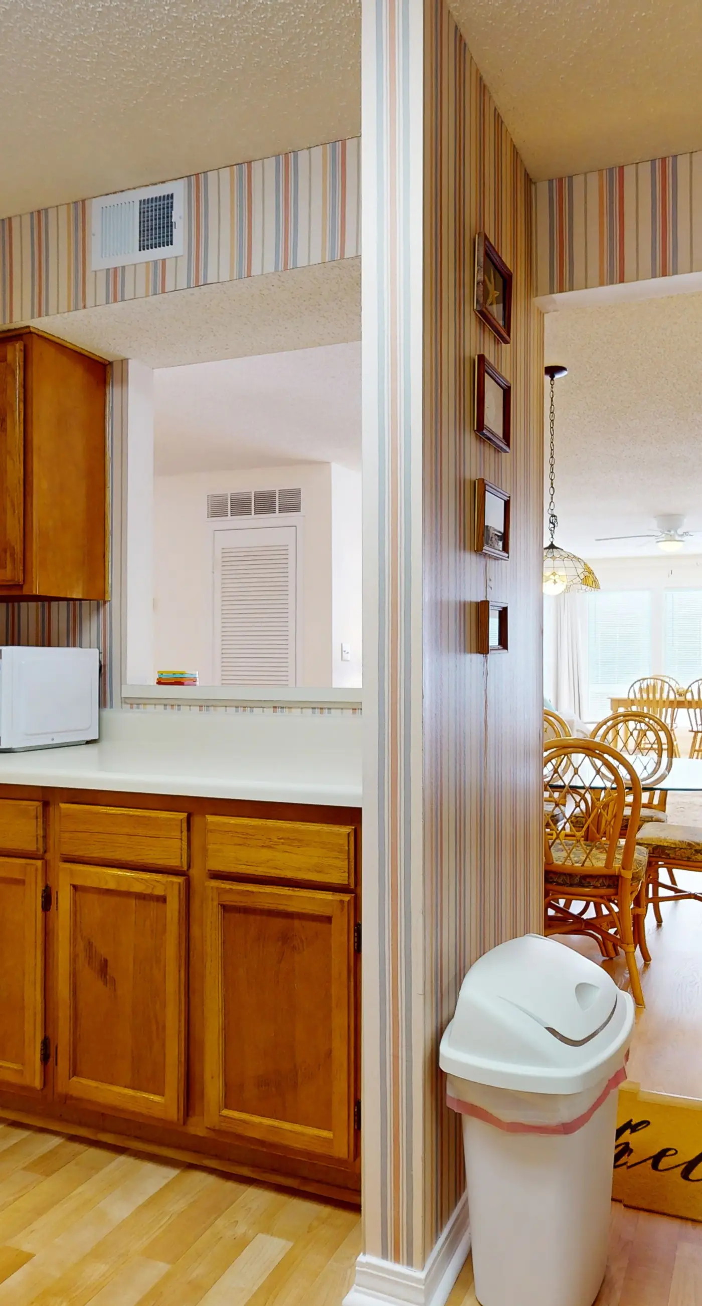 Beach-themed condo with shared pool, pier, and beach access