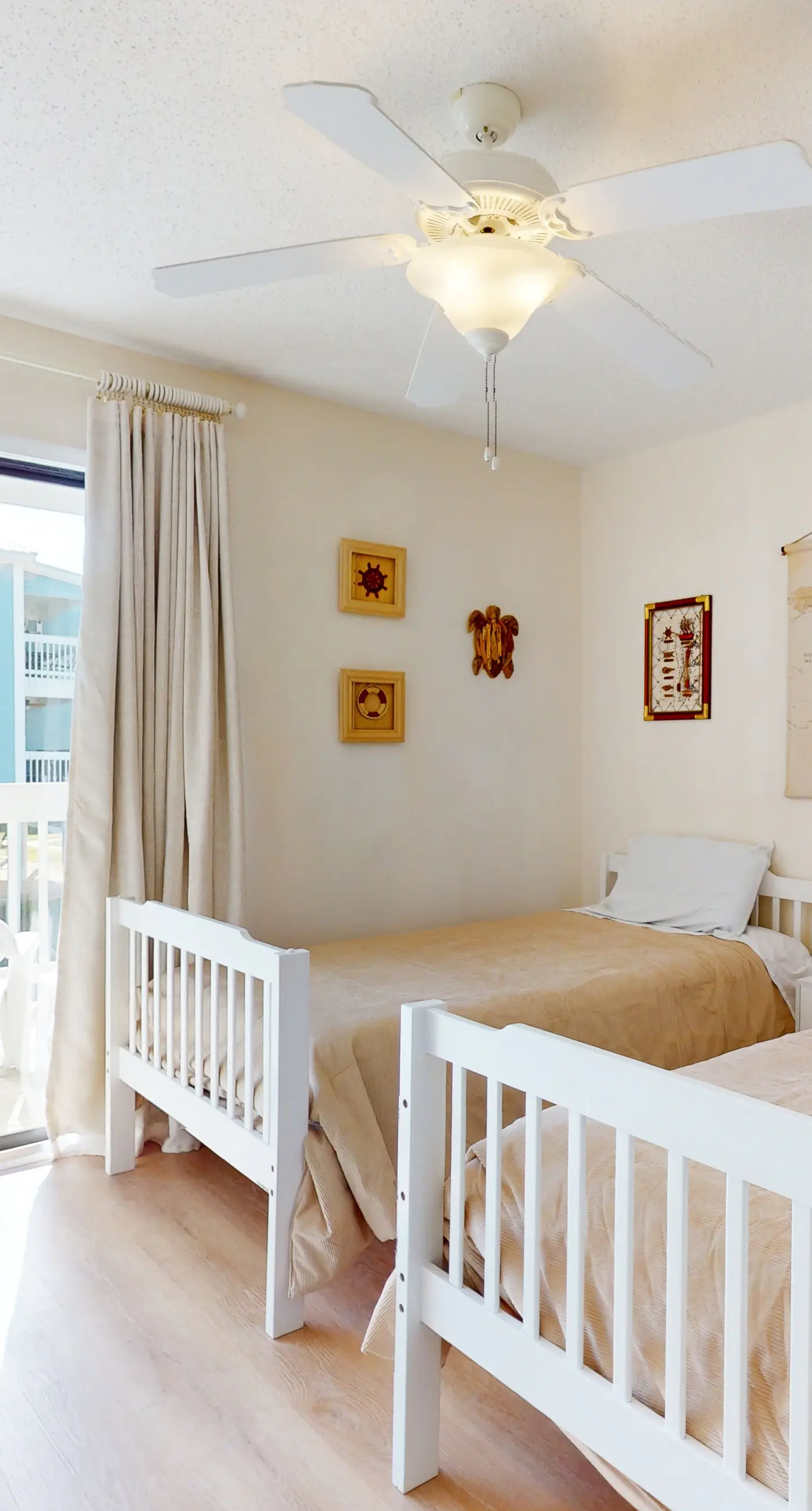 Beach-themed condo with shared pool, pier, and beach access