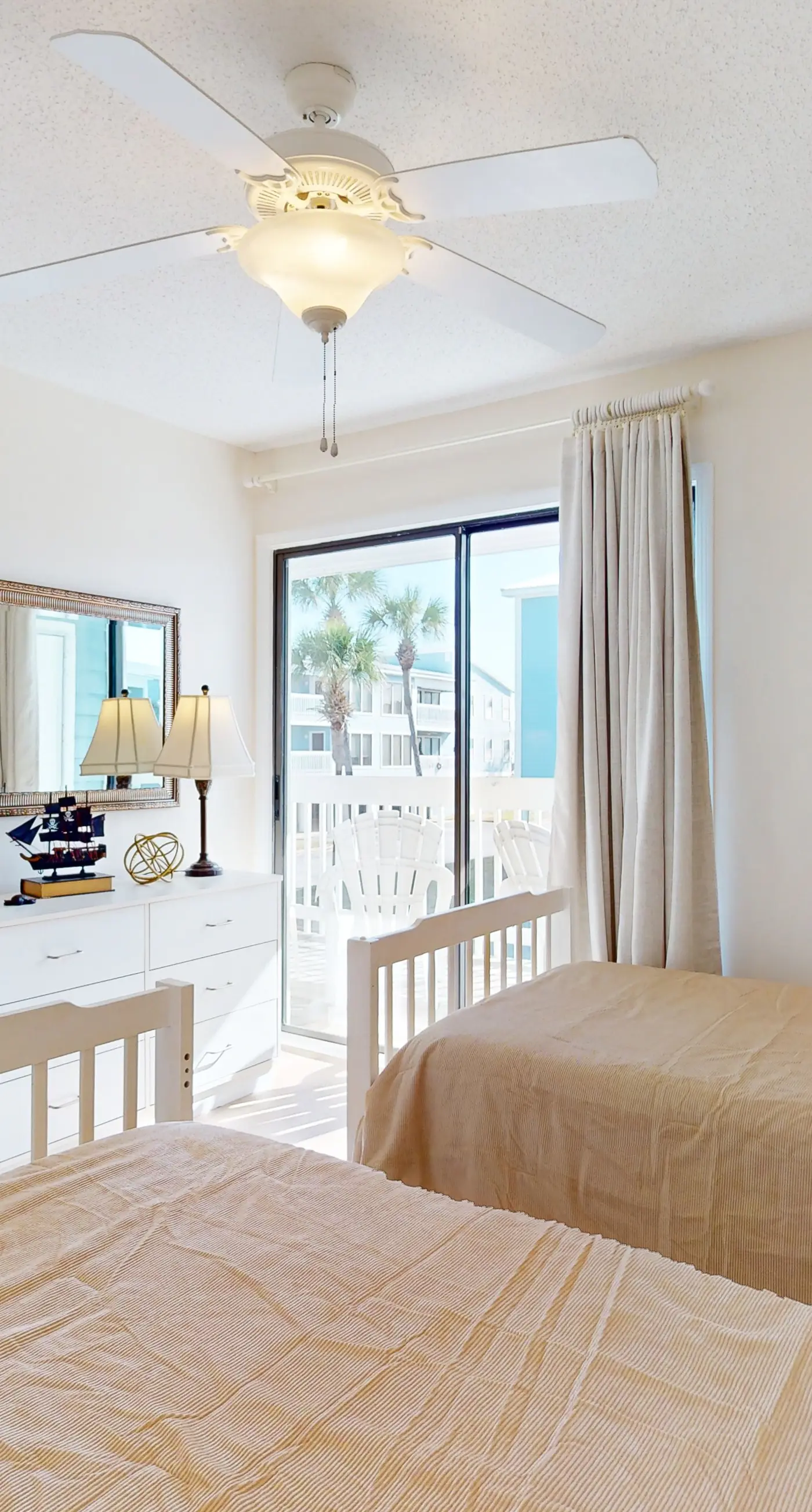 Beach-themed condo with shared pool, pier, and beach access