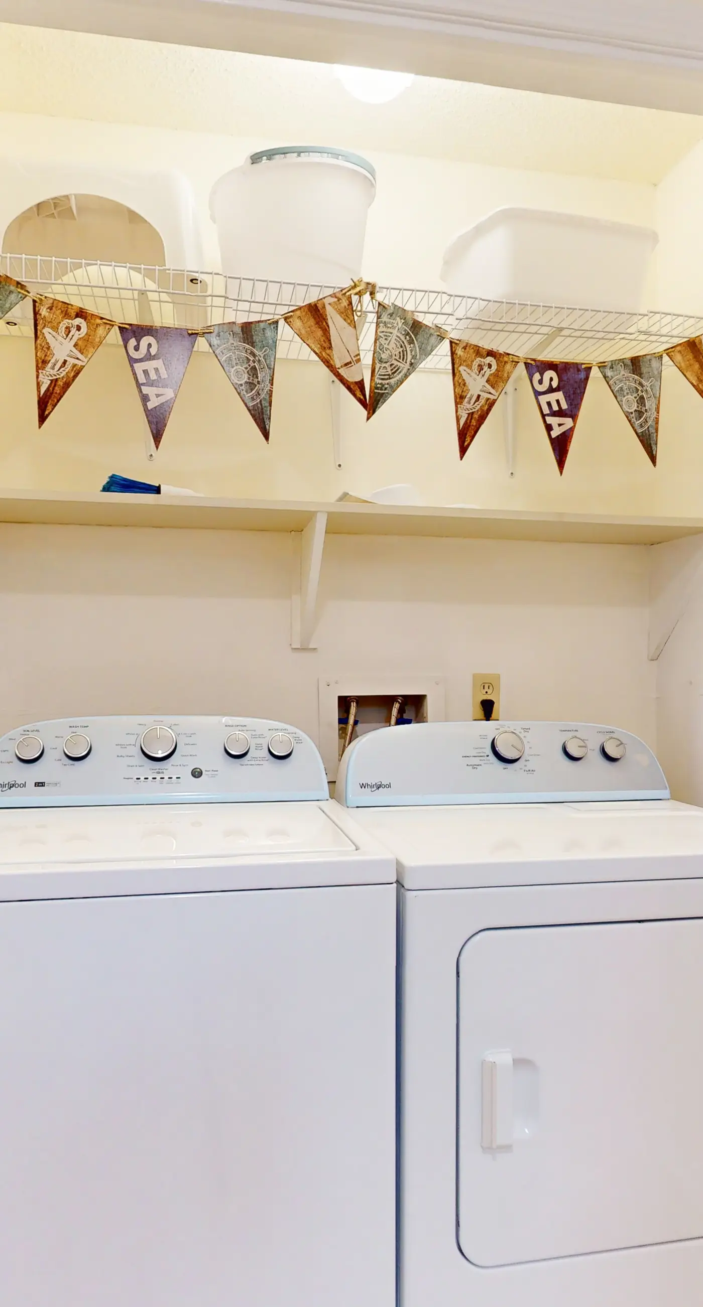 Beach-themed condo with shared pool, pier, and beach access