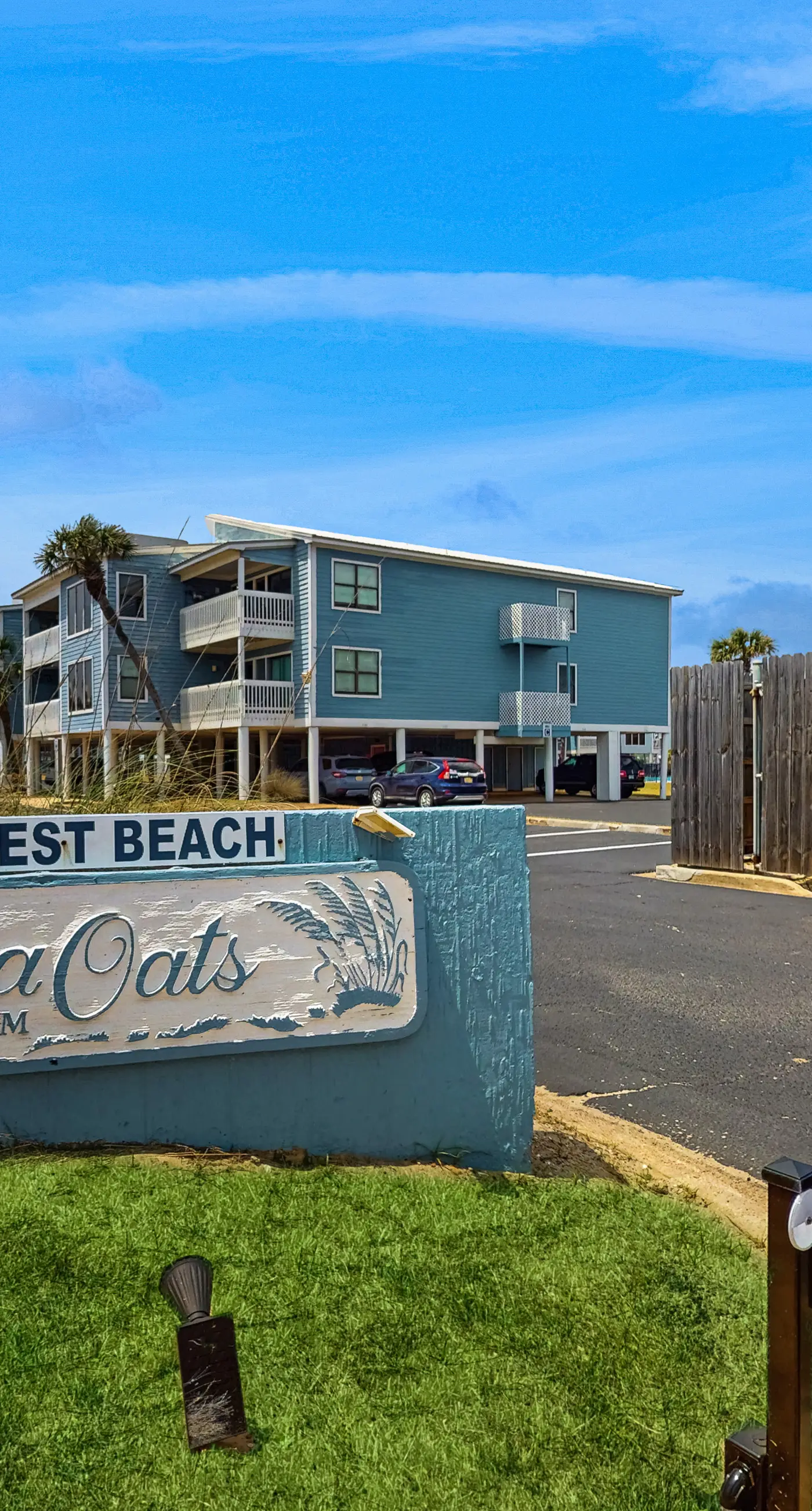 Beach-themed condo with shared pool, pier, and beach access