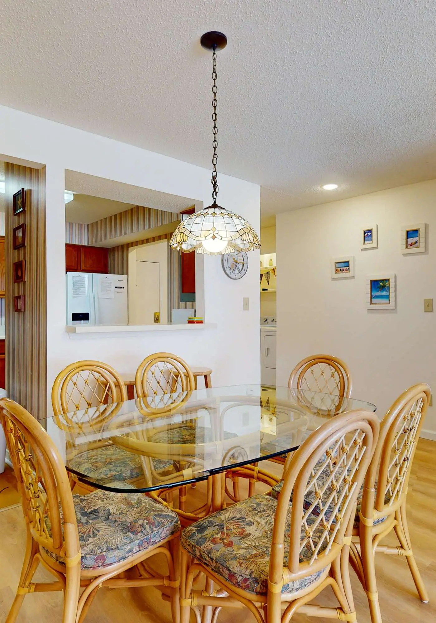Beach-themed condo with shared pool, pier, and beach access