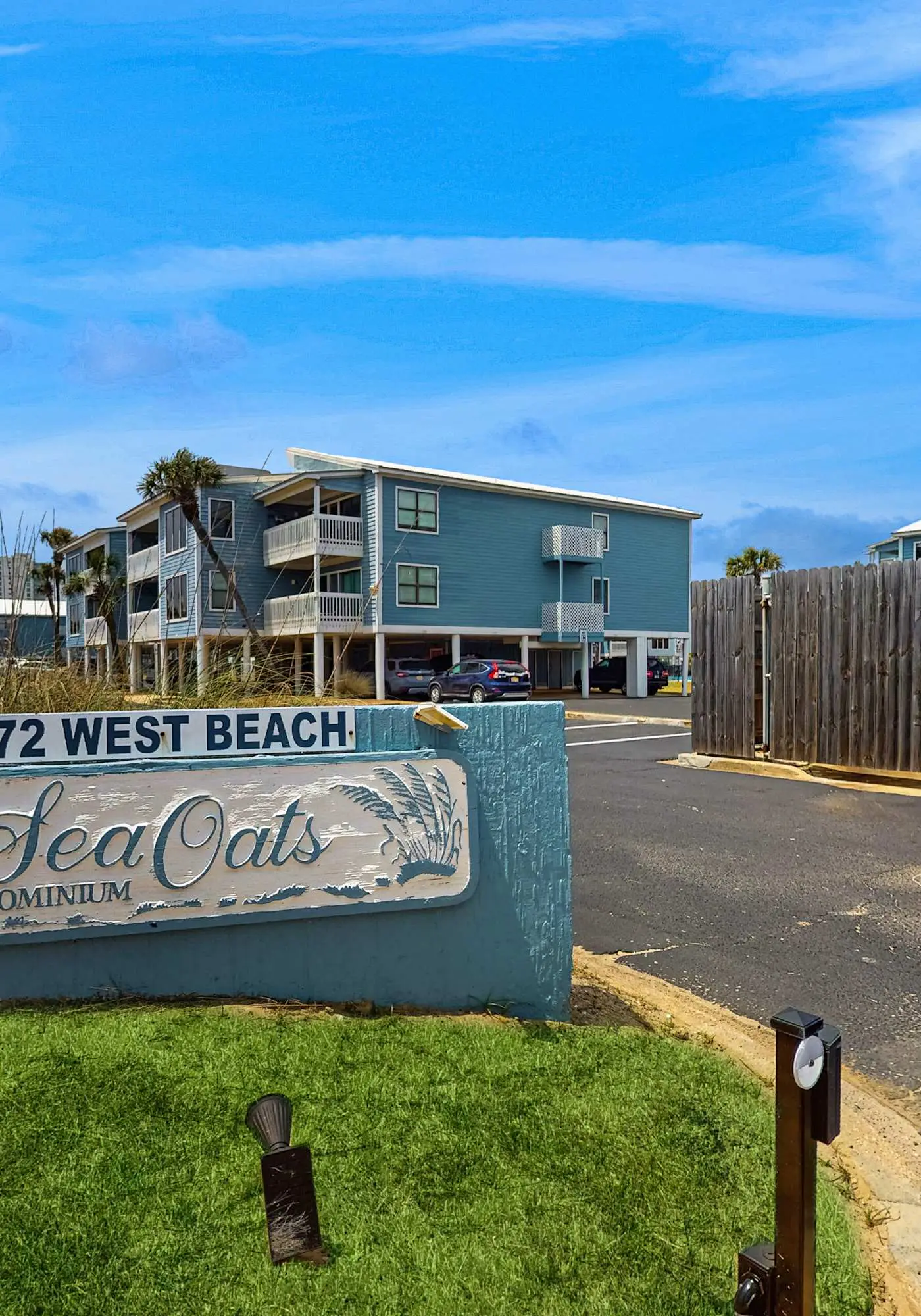 Beach-themed condo with shared pool, pier, and beach access