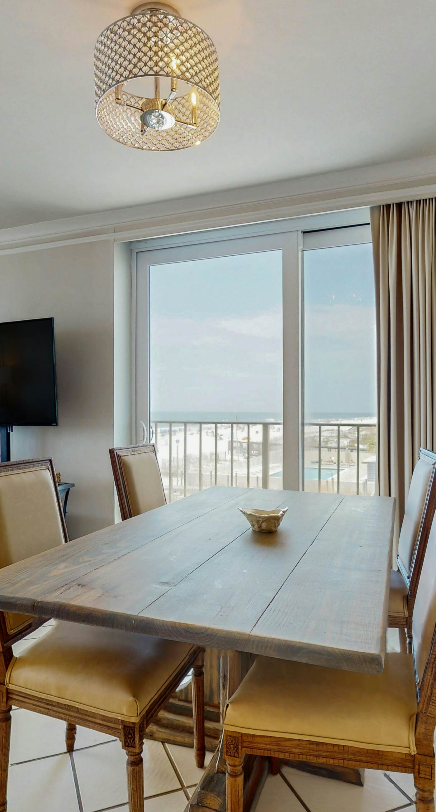 Beachfront condo with Gulf views, balcony, pool & AC - snowbird-friendly