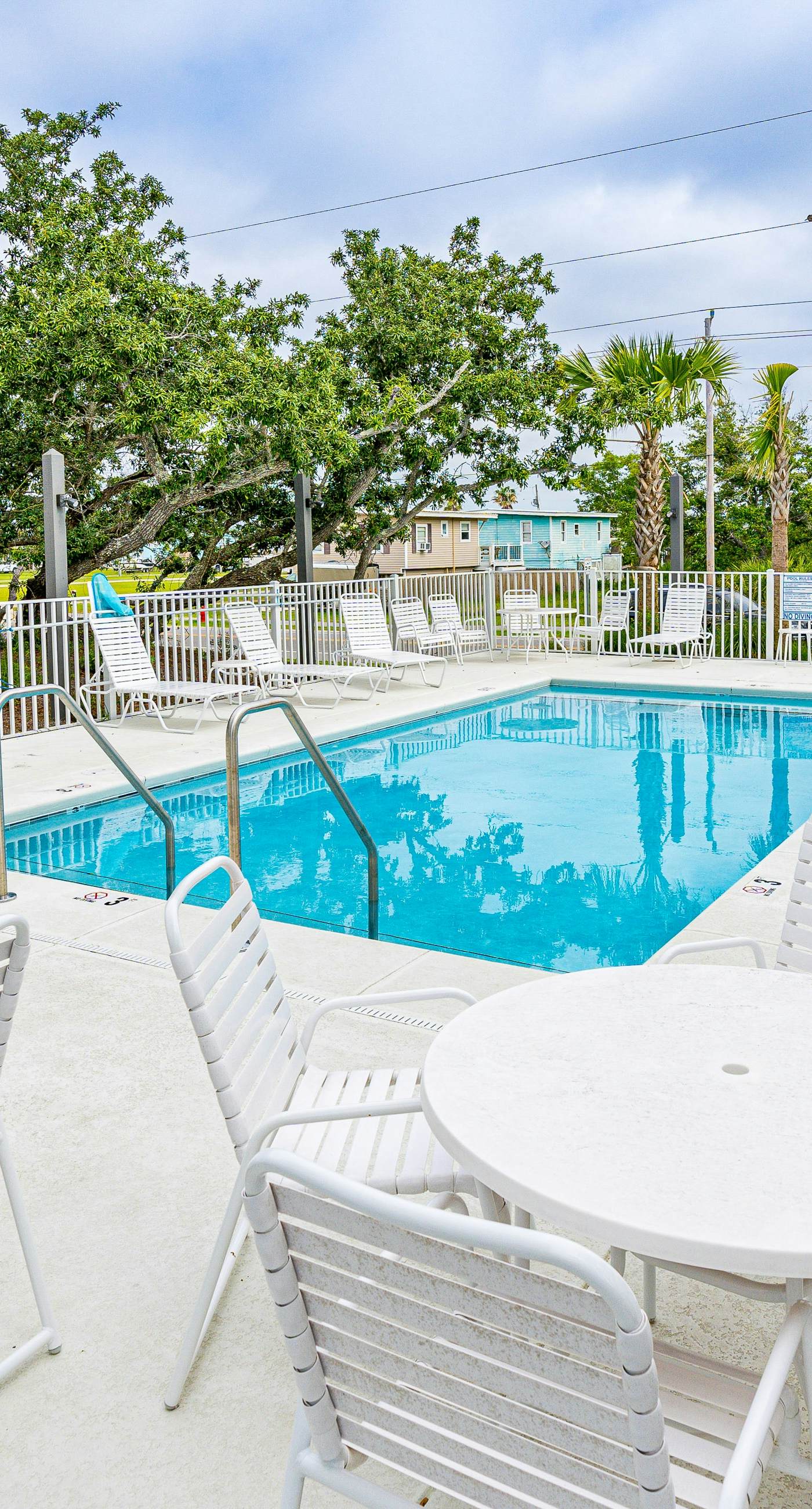New home near the beach with on-site pool,hot tub, private balcony, & W&D