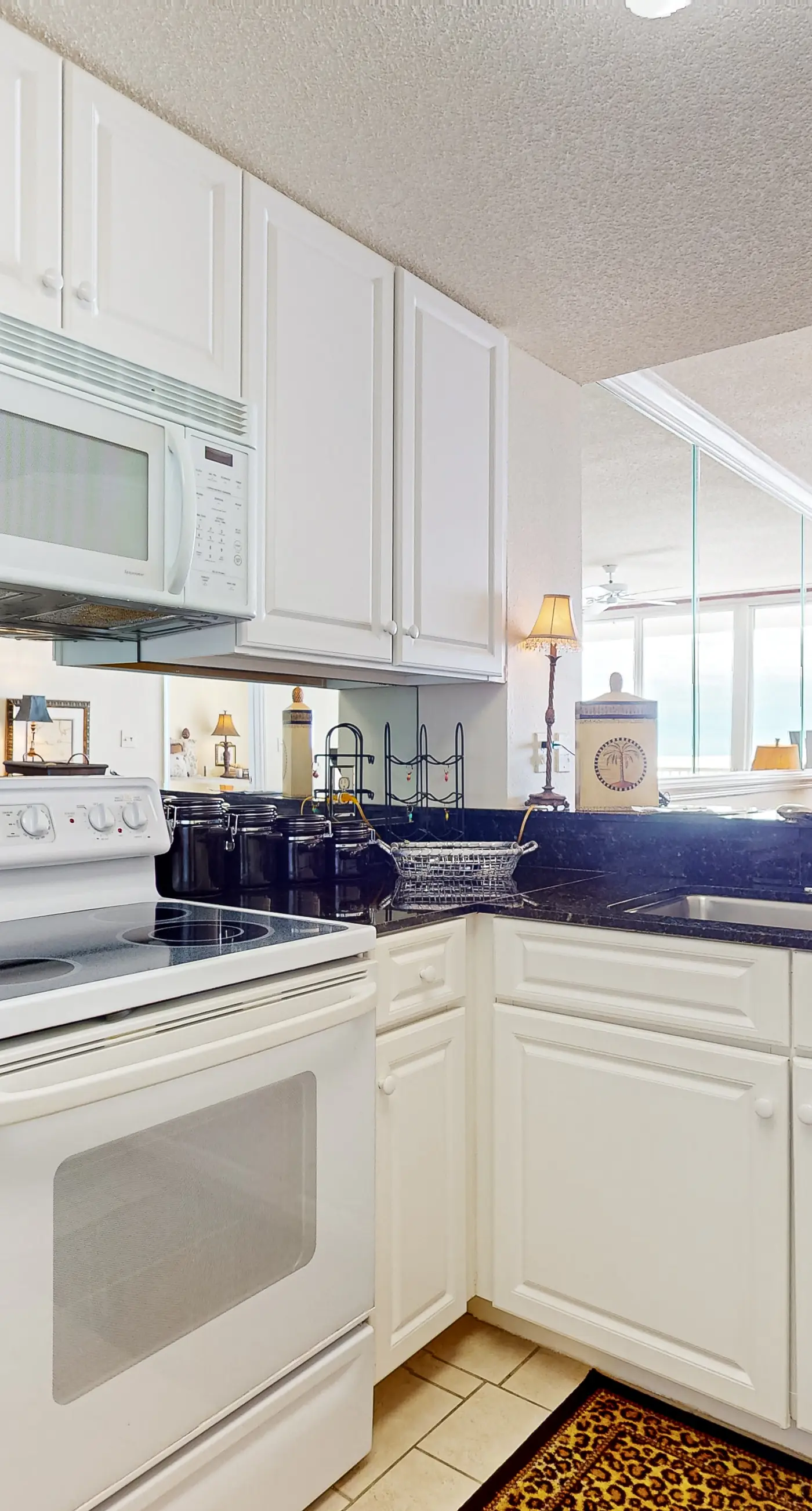 Gulf-front 10th-floor condo with beach views, sauna, gym, volleyball, pools, AC