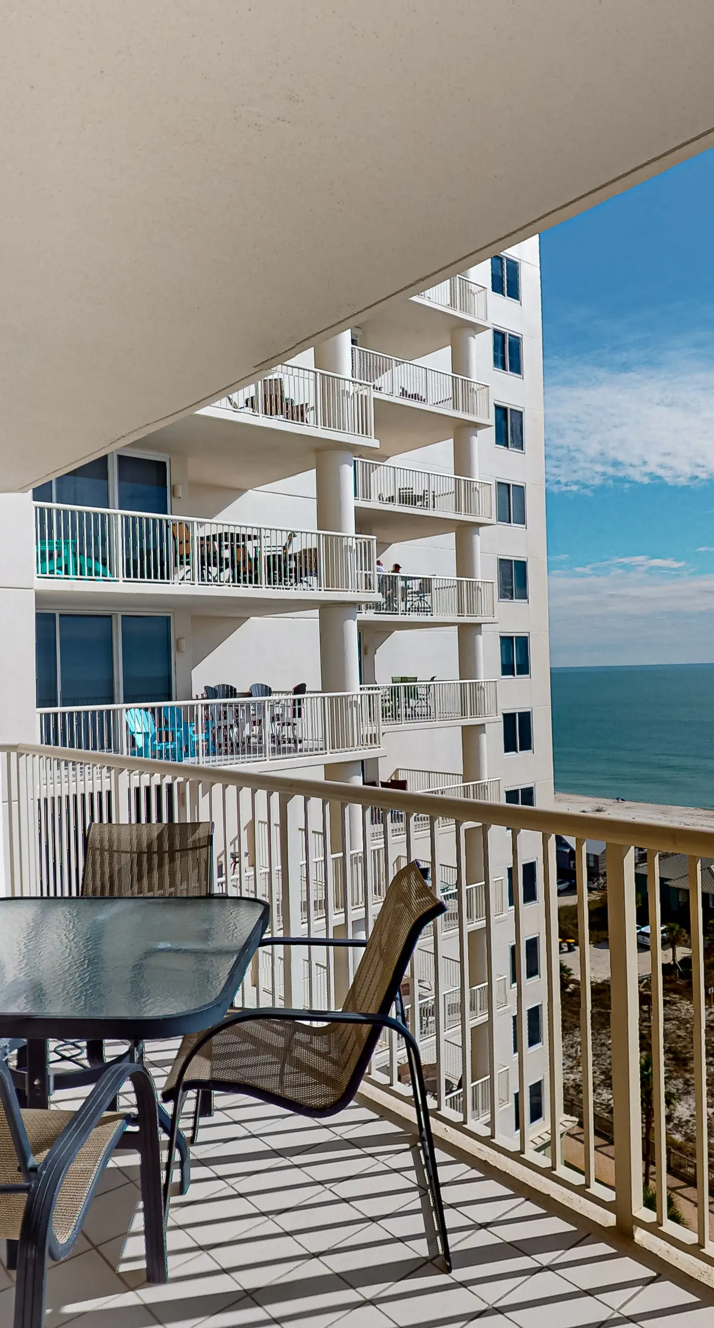 Gulf-front 10th-floor condo with beach views, sauna, gym, volleyball, pools, AC