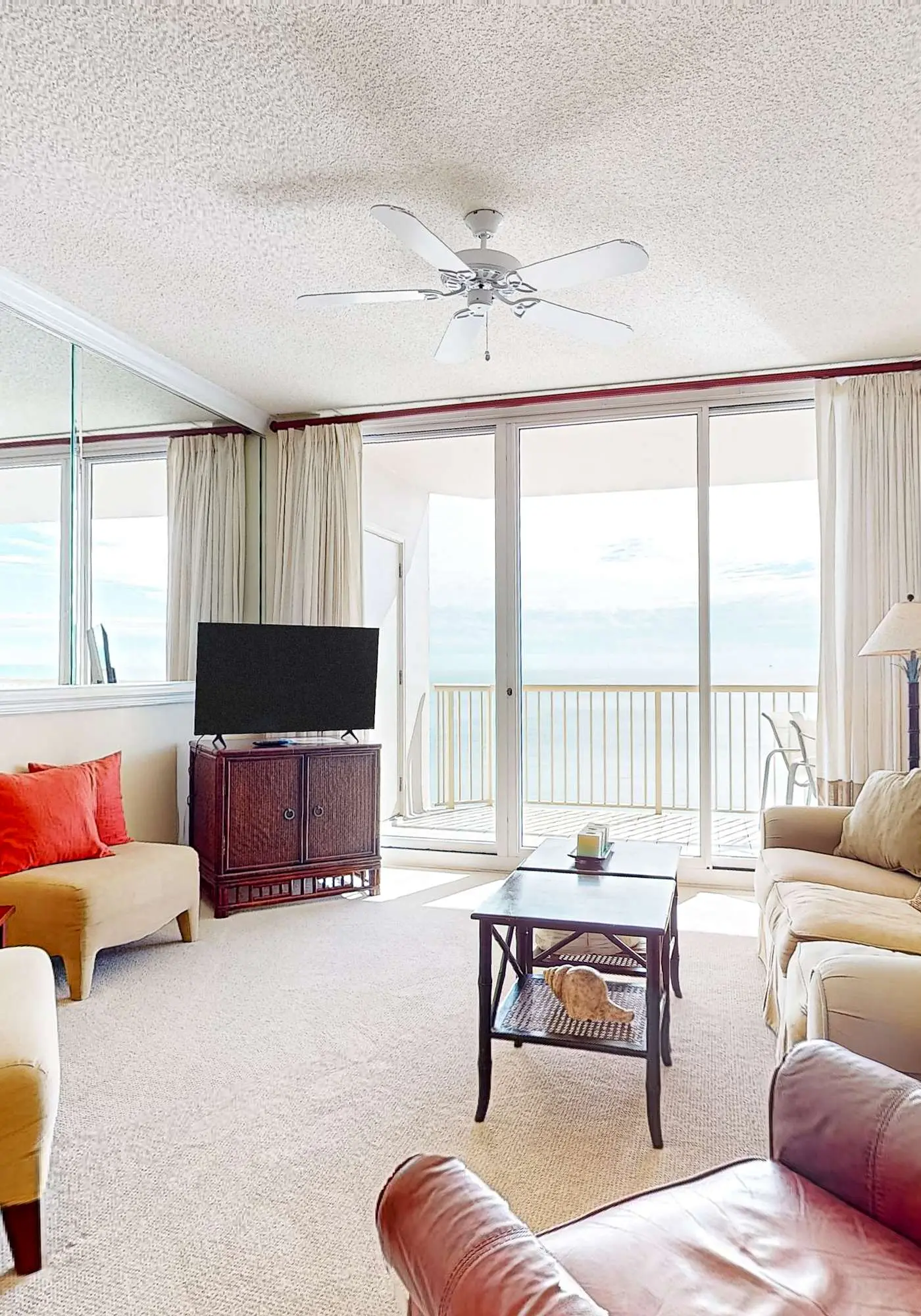 Gulf-front 10th-floor condo with beach views, sauna, gym, volleyball, pools, AC