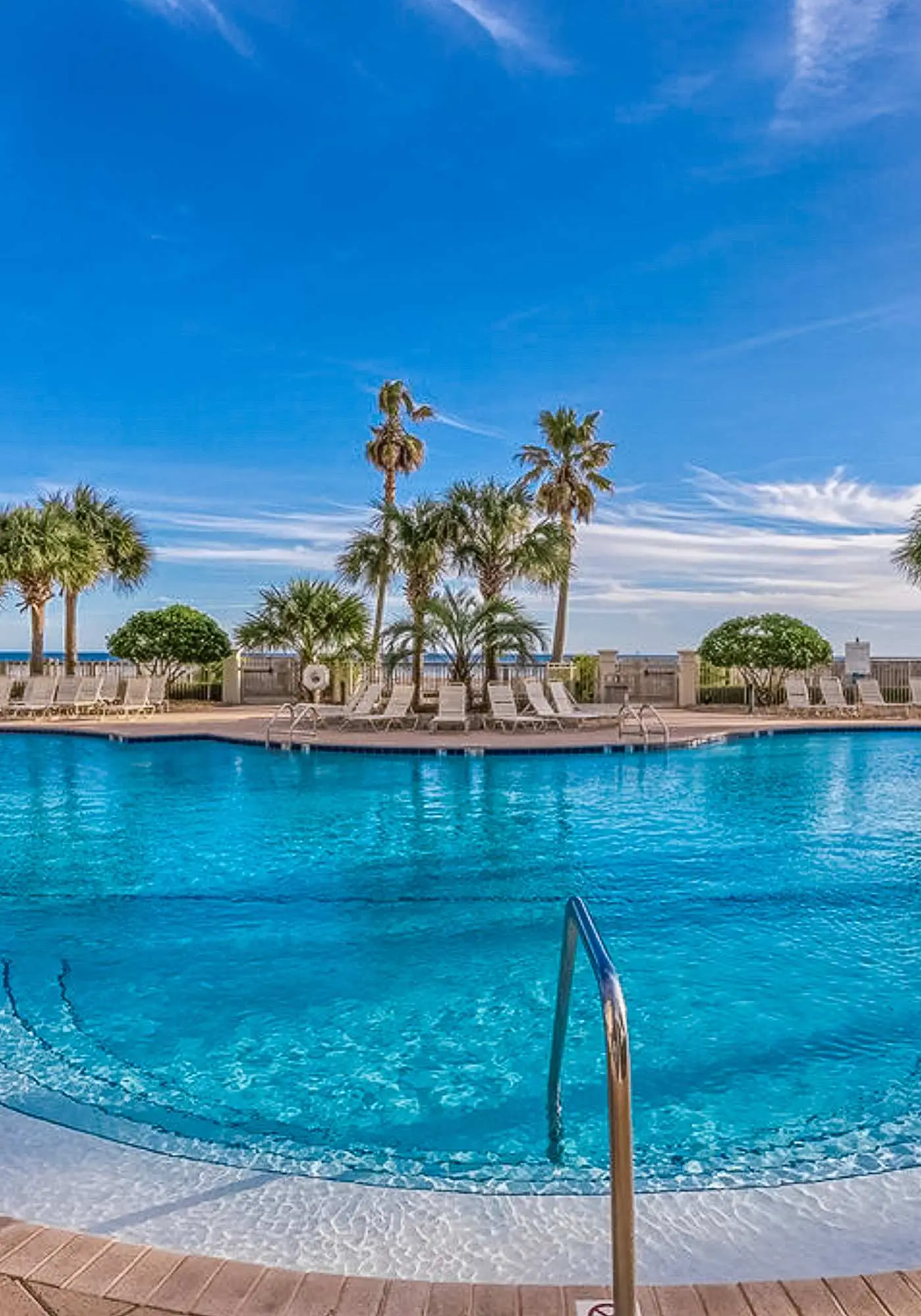 Gulf-front 10th-floor condo with beach views, sauna, gym, volleyball, pools, AC