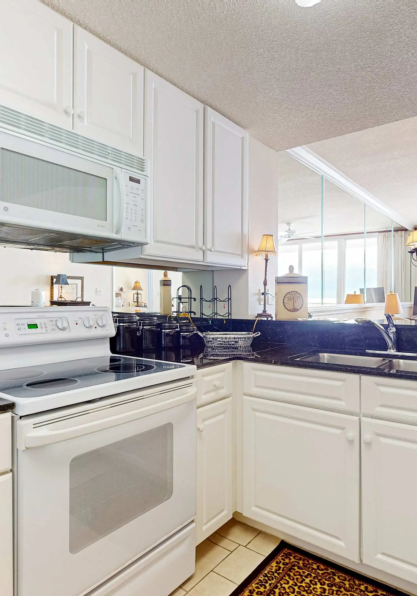 Gulf-front 10th-floor condo with beach views, sauna, gym, volleyball, pools, AC