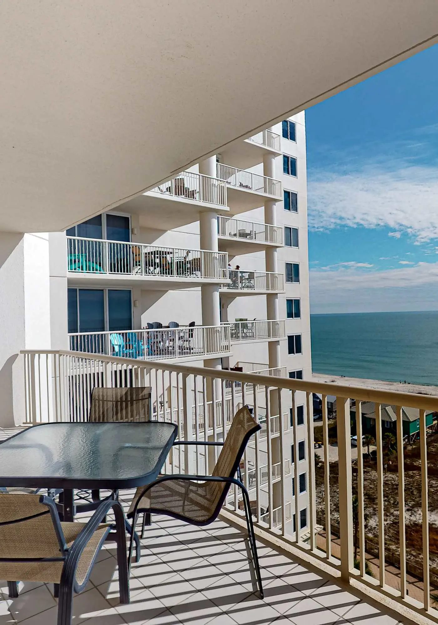 Gulf-front 10th-floor condo with beach views, sauna, gym, volleyball, pools, AC