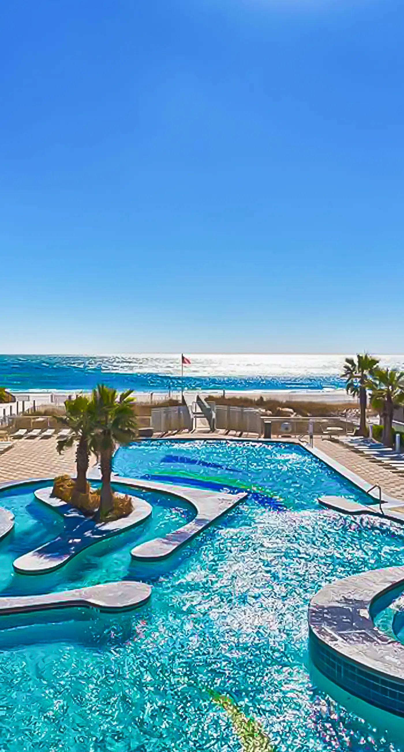 Gorgeous Gulf view condo with indoor,outdoor pools, hot tubs, gym, & balconies