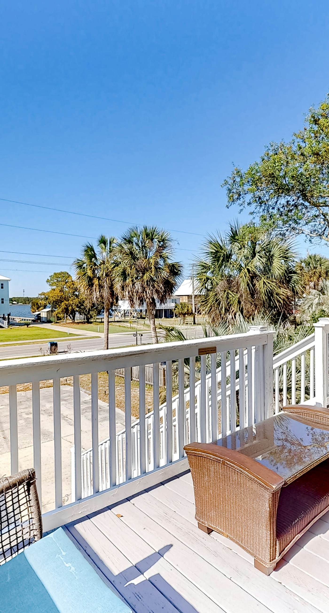 Dog-friendly duplex with a full kitchen, furnished deck, beach gear, & AC