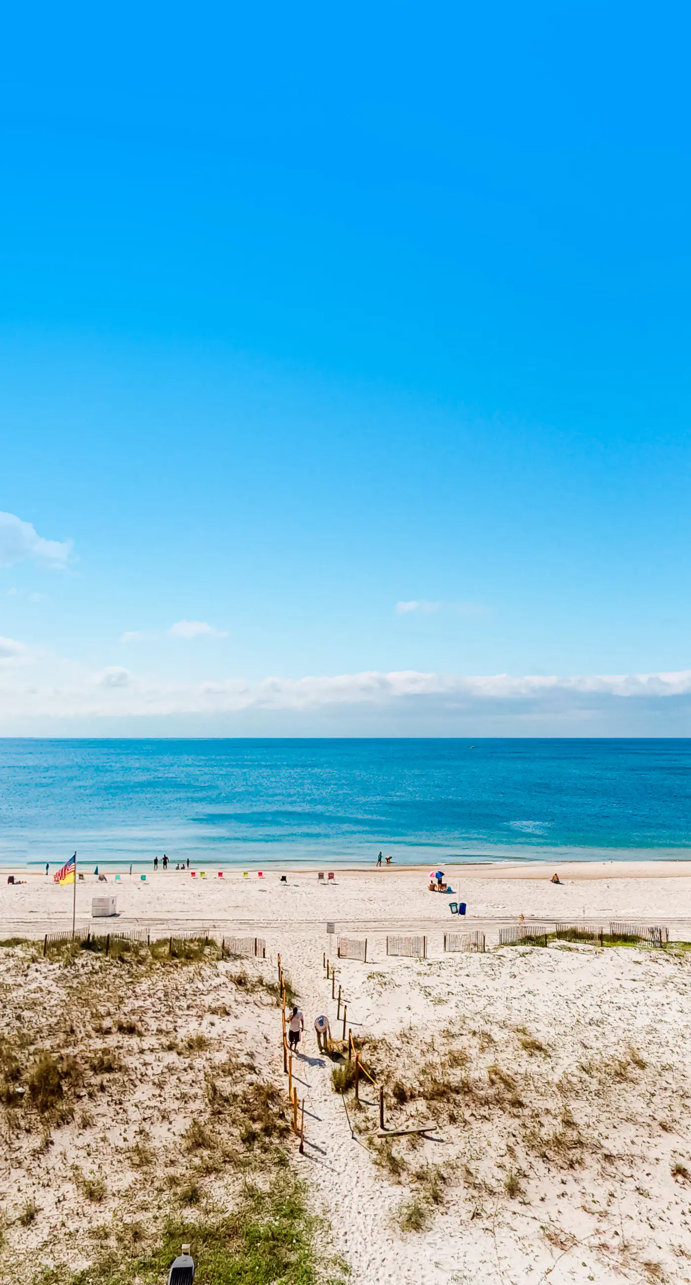 Sunny gulf-front condo with private balcony, shared outdoor pool, great views