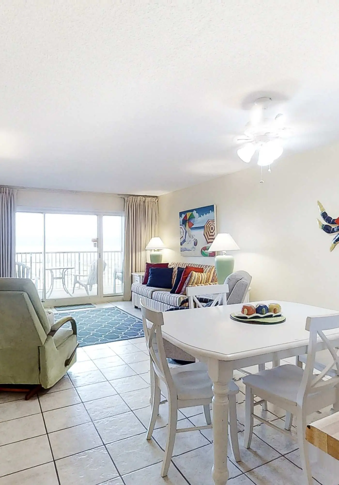 Sunny gulf-front condo with private balcony, shared outdoor pool, great views