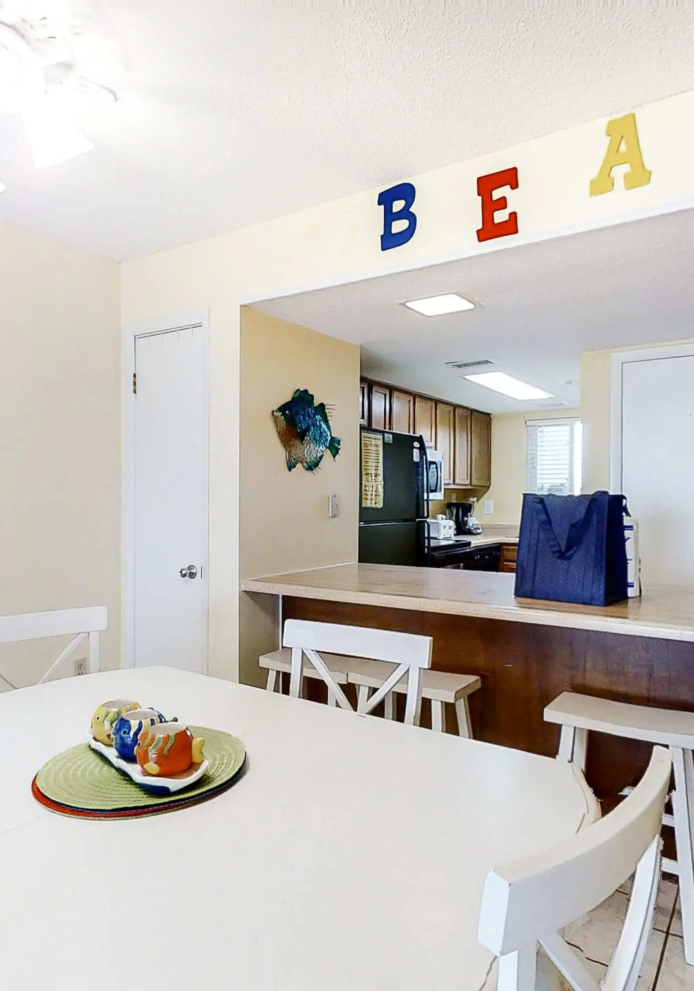 Sunny gulf-front condo with private balcony, shared outdoor pool, great views