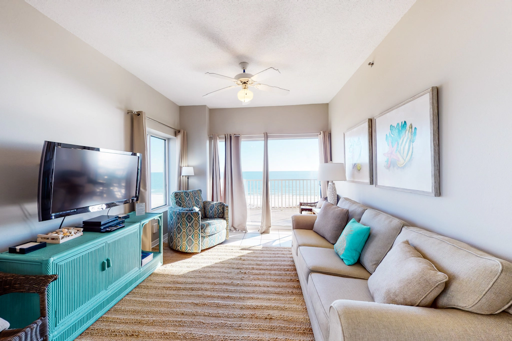 Beachfront vacation home with spacious balconies, beach access, pools & hot tub