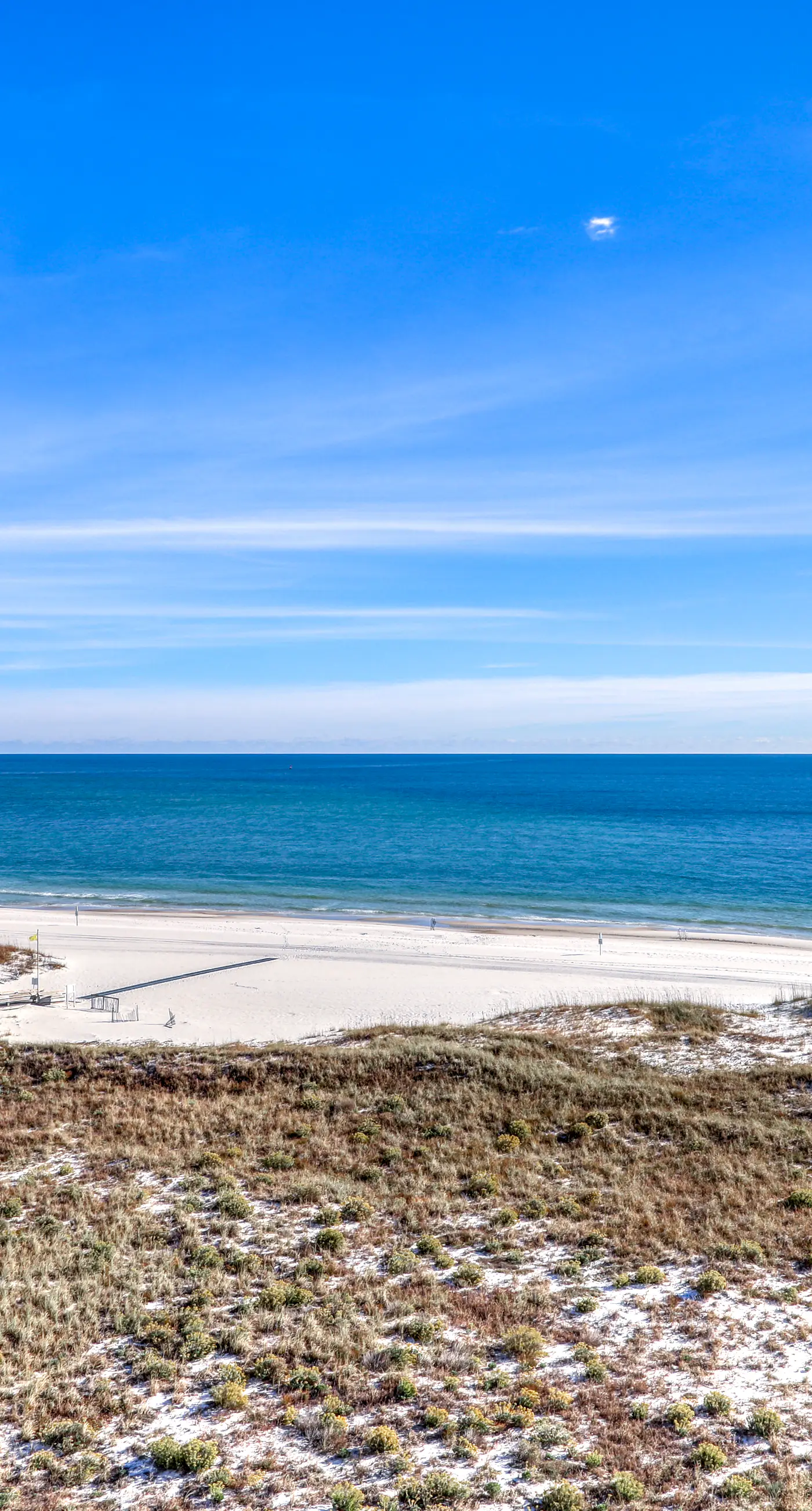 Beachfront vacation home with spacious balconies, beach access, pools & hot tub