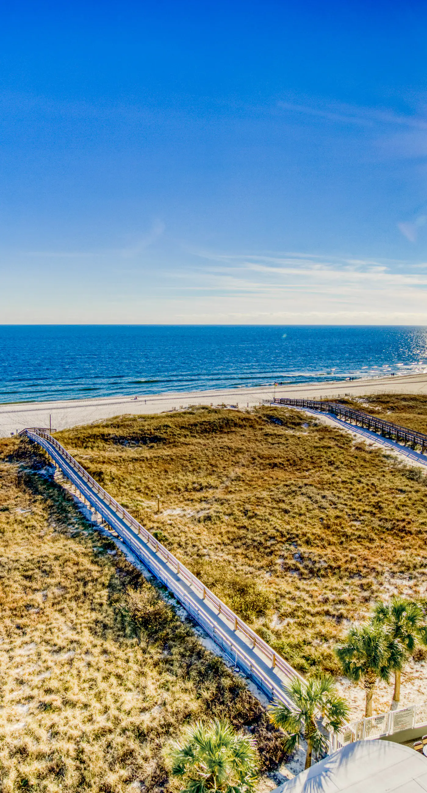Beachfront vacation home with spacious balconies, beach access, pools & hot tub