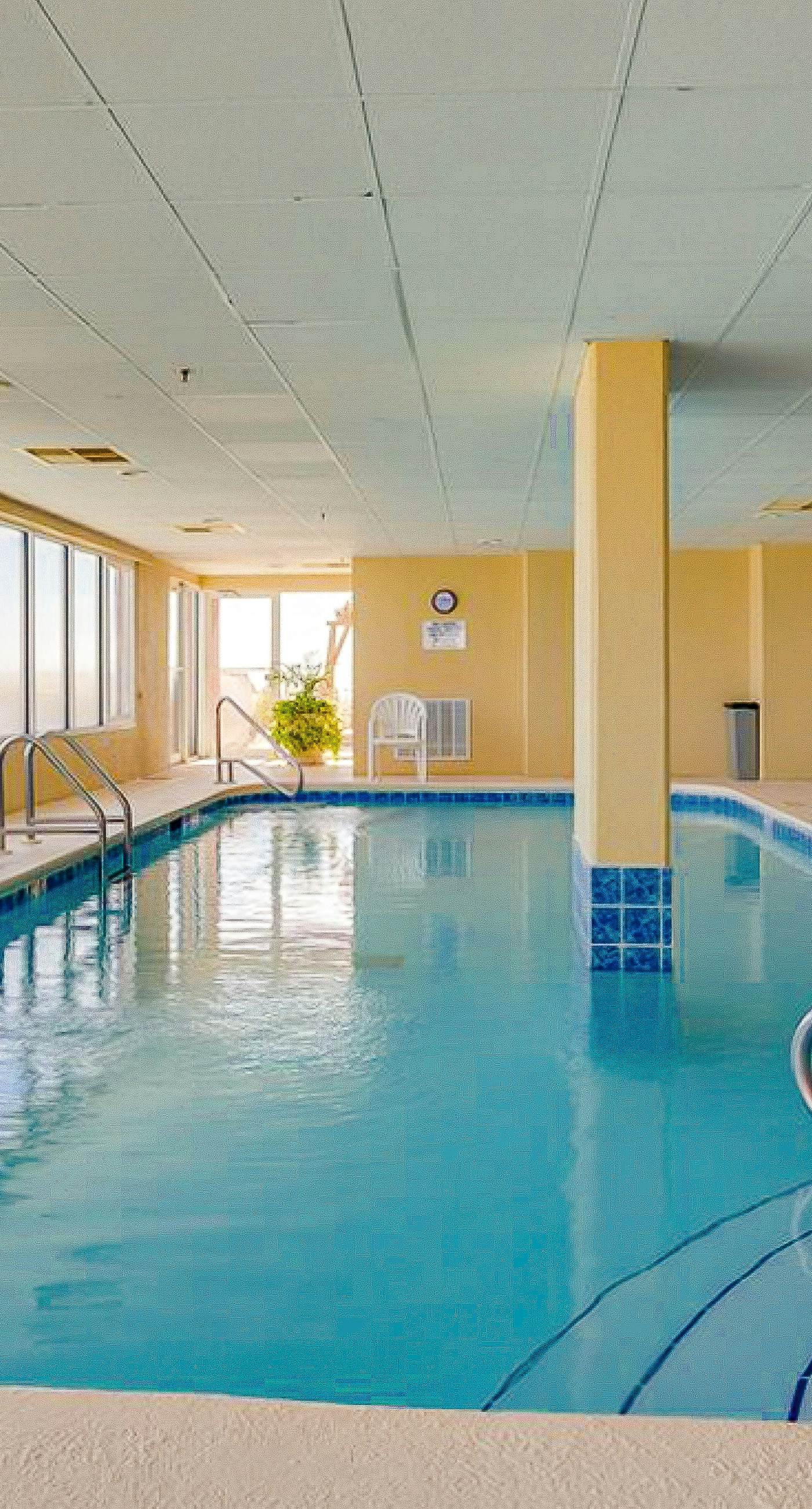 Beach-front condo with pool, hot tub, sauna, washer,dryer & grill