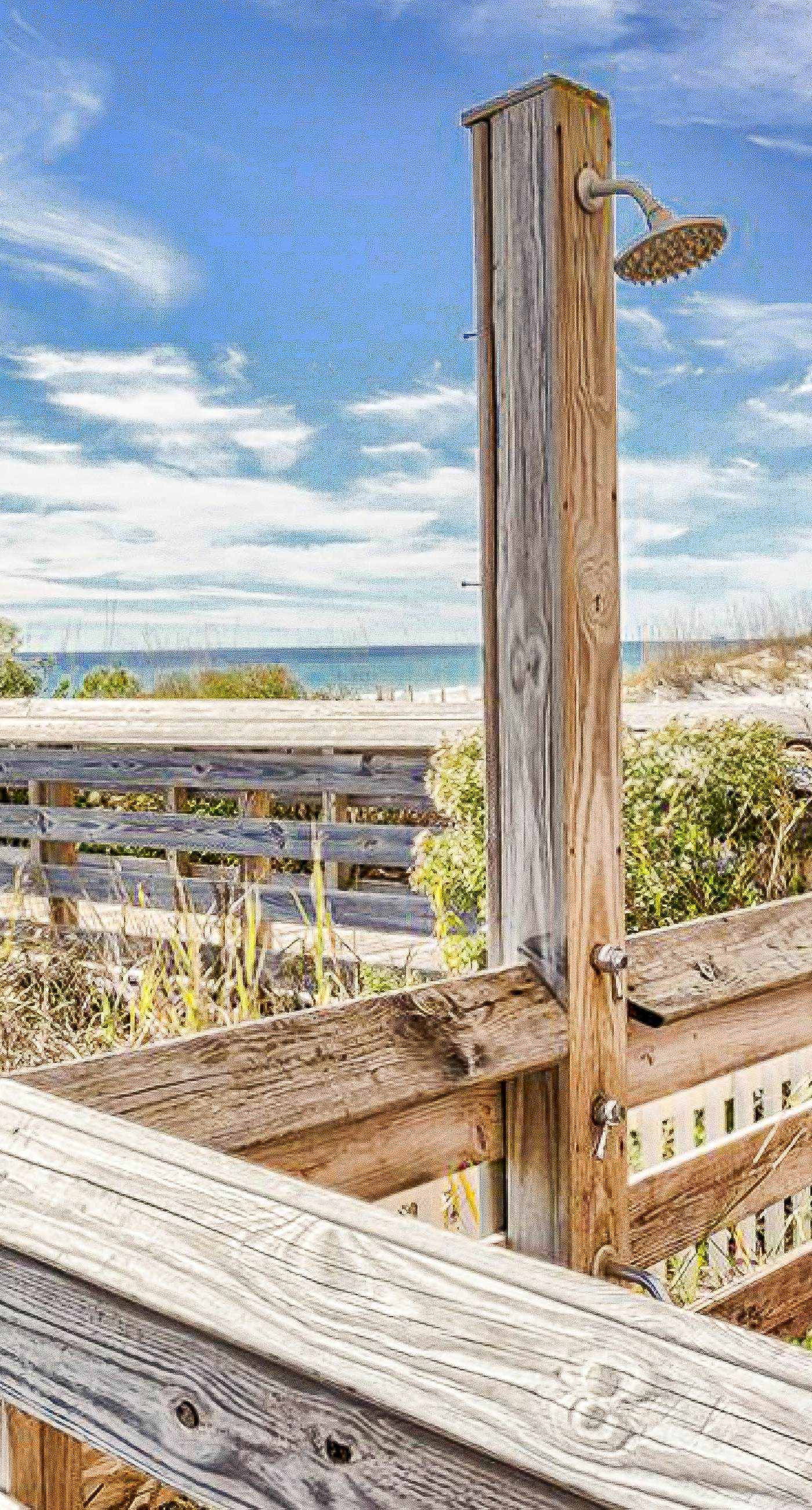 Beach-front condo with pool, hot tub, sauna, washer,dryer & grill