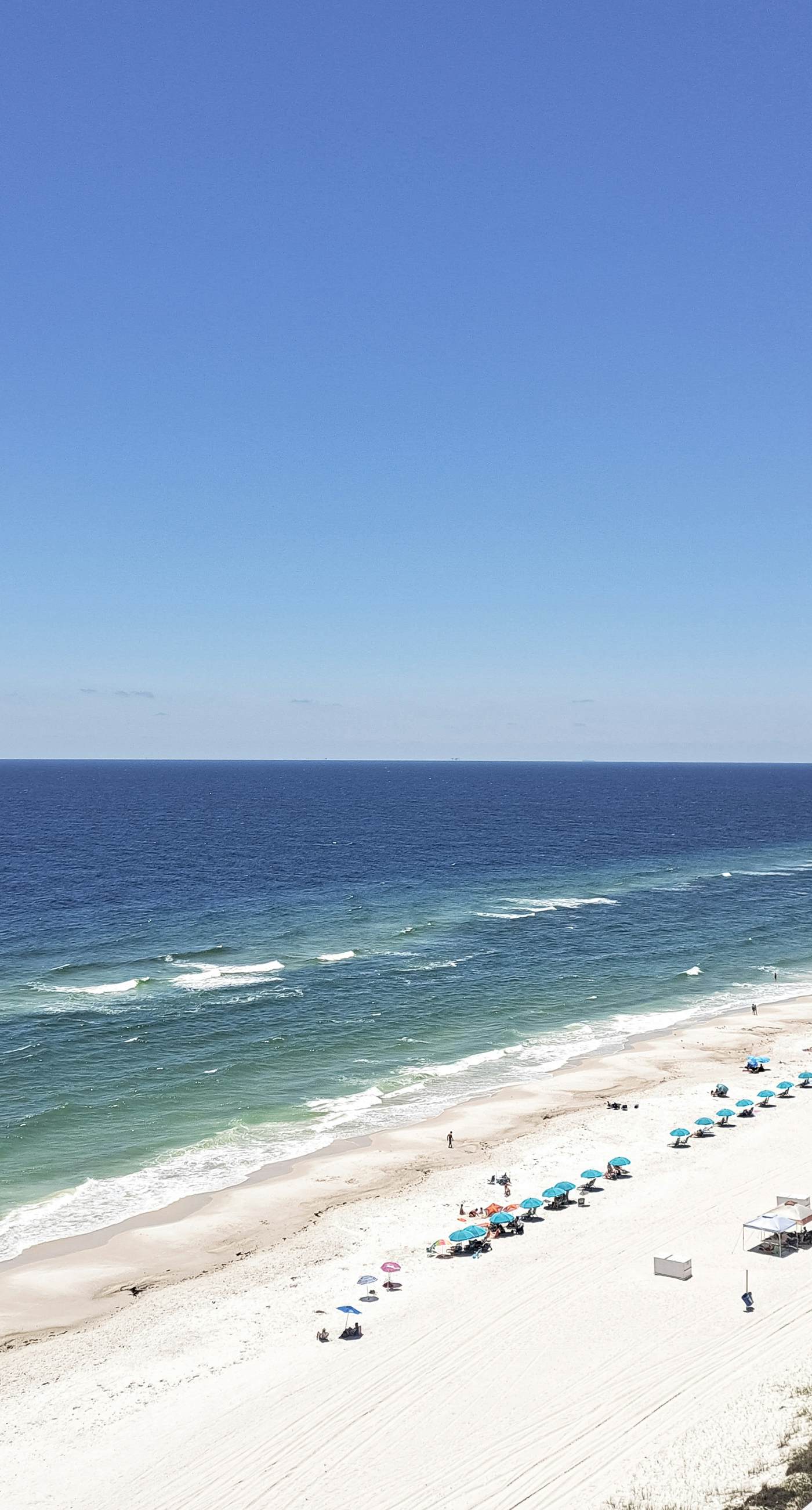 Beach-front condo with pool, hot tub, sauna, washer,dryer & grill